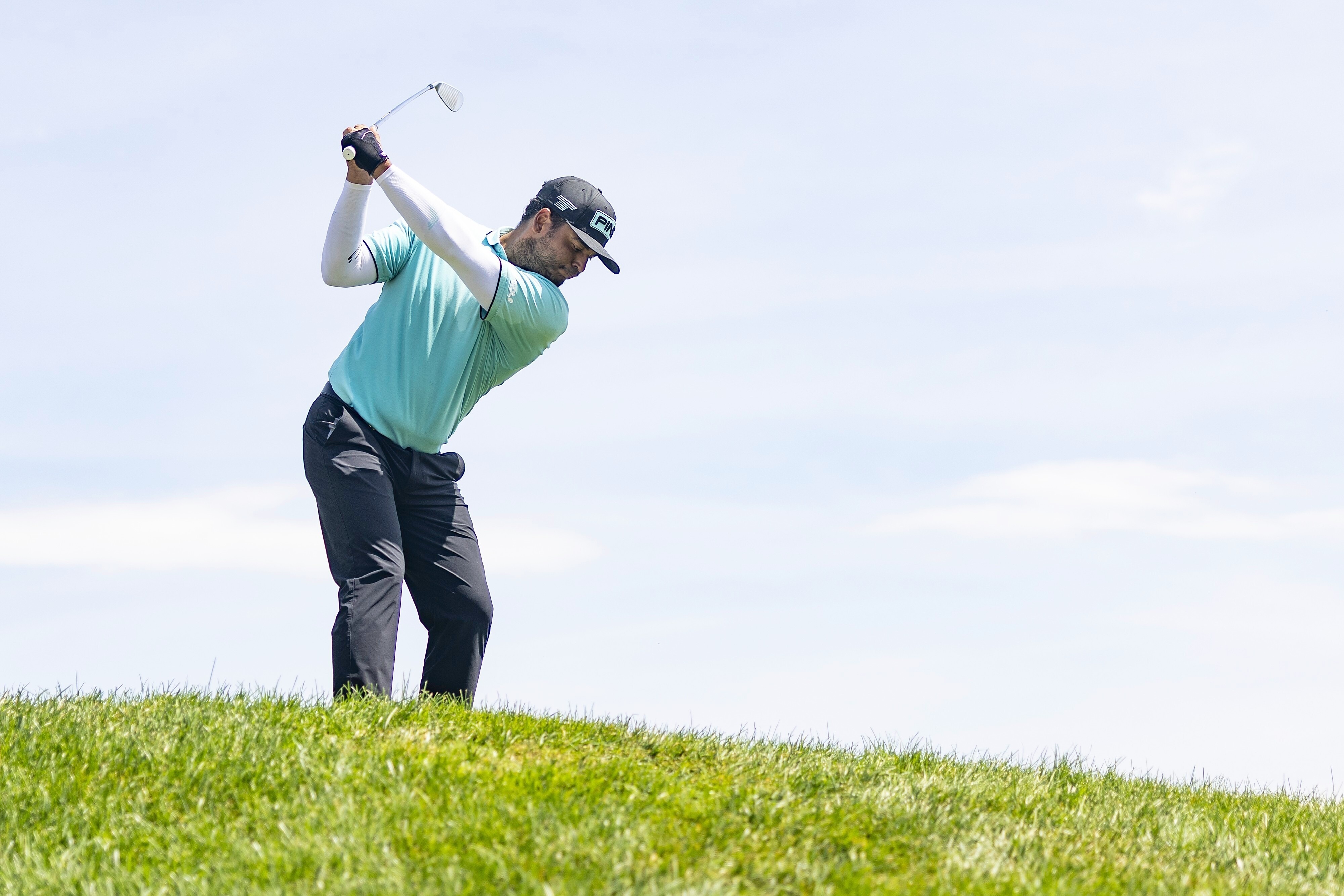 Sebastián Muñoz, of Torque GC, hits from the sixth fairway during the final round of LIV Golf Indianapolis at The Club at Chatham Hills, Sunday, Aug. 17, 2025, in Westfield, Ind.