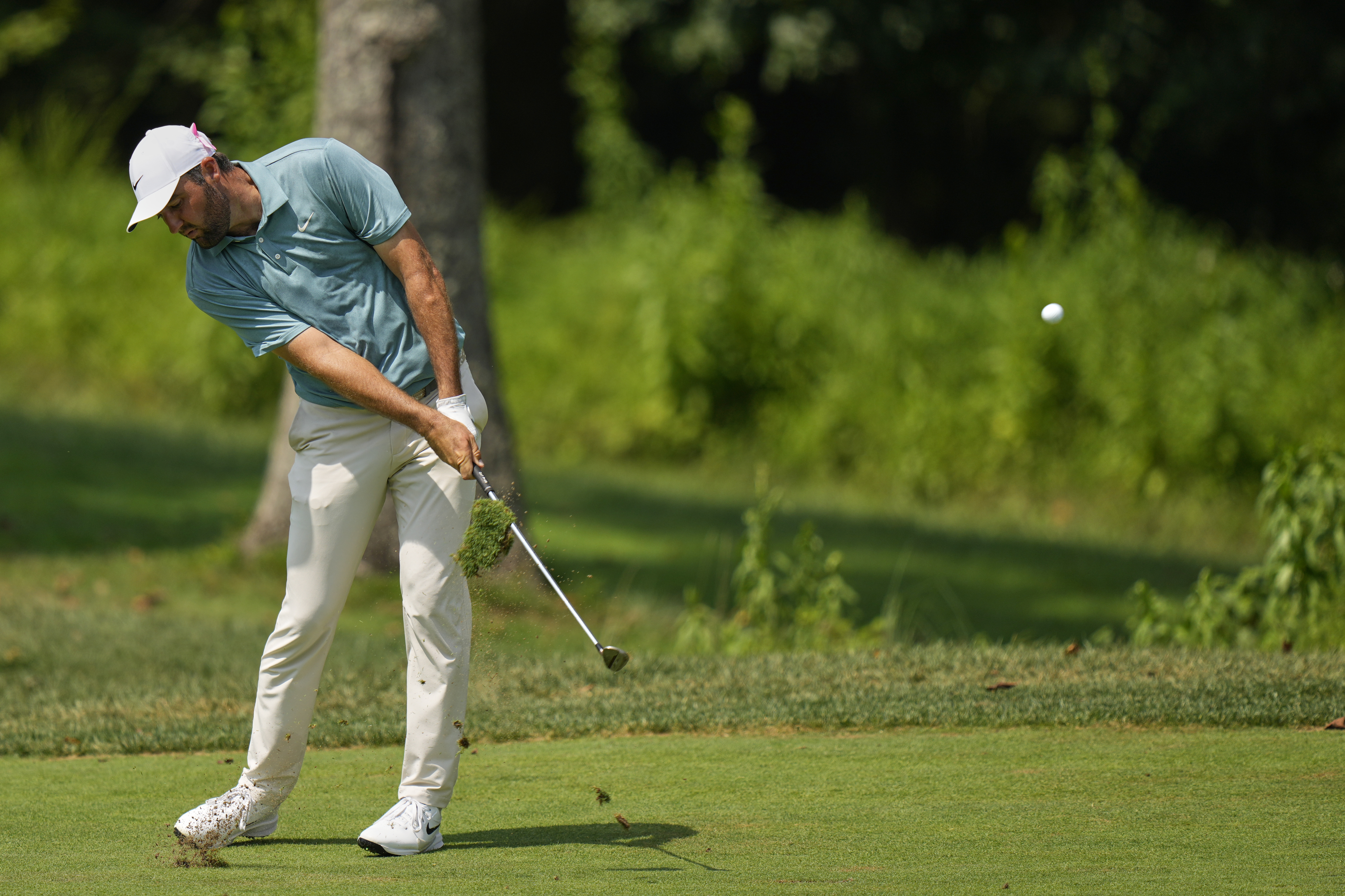 Scottie Scheffler hits on the first hole during the final round of the BMW Championship golf tournament Sunday, Aug. 17, 2025, in Owings Mills, Md.