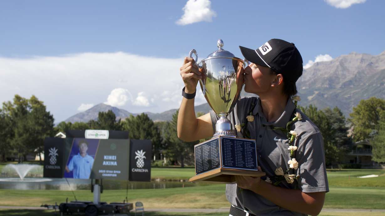BYU incoming freshman Kihei Akina poses with the trophy after winning the 99th annual Larry H. Miller Utah Open, Sunday, Aug. 17, 2025 at Riverside Country Club in Provo, Utah.
