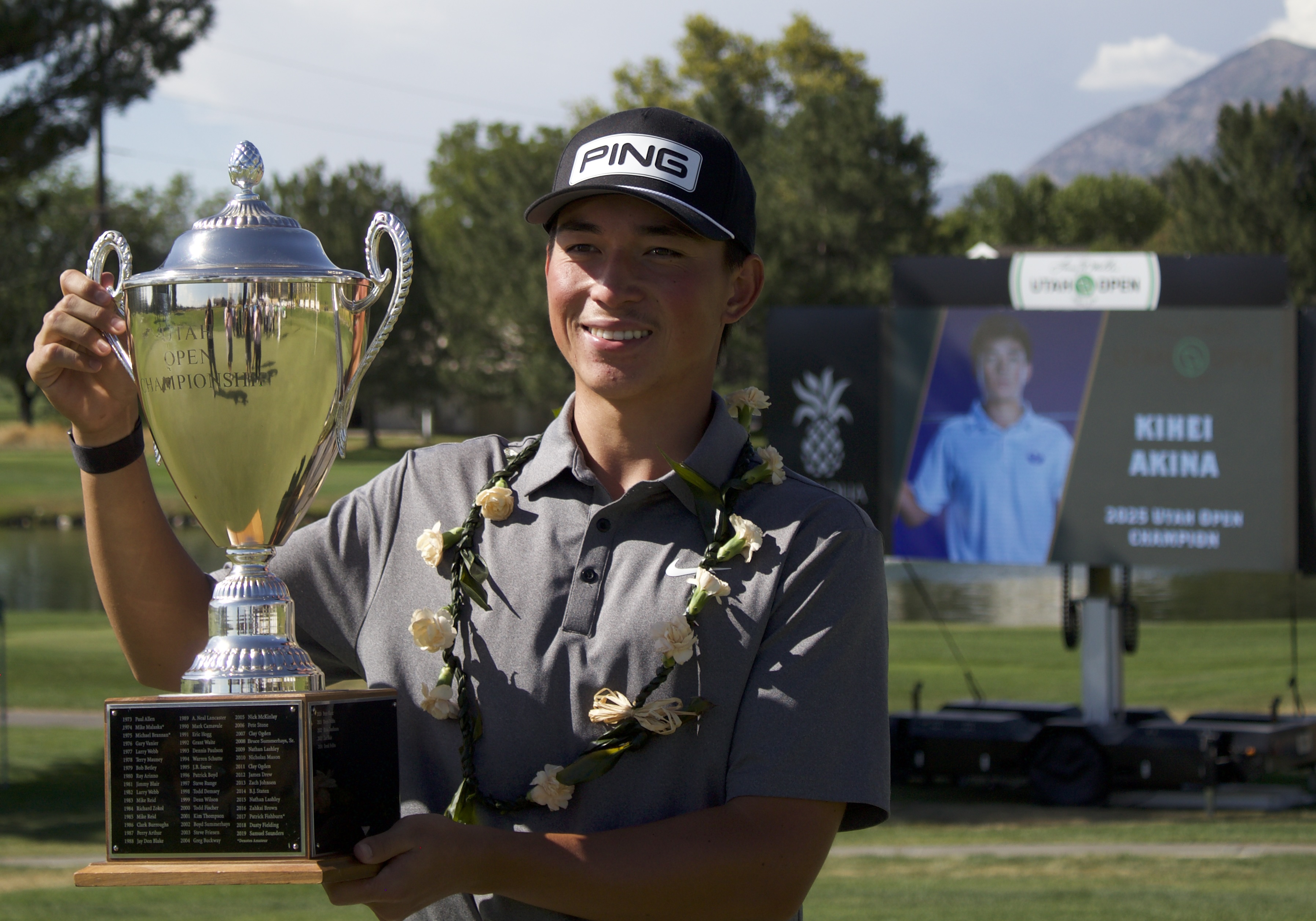 BYU incoming freshman Kihei Akina poses with the trophy after winning the 99th annual Larry H. Miller Utah Open, Sunday, Aug. 17, 2025 at Riverside Country Club in Provo, Utah.