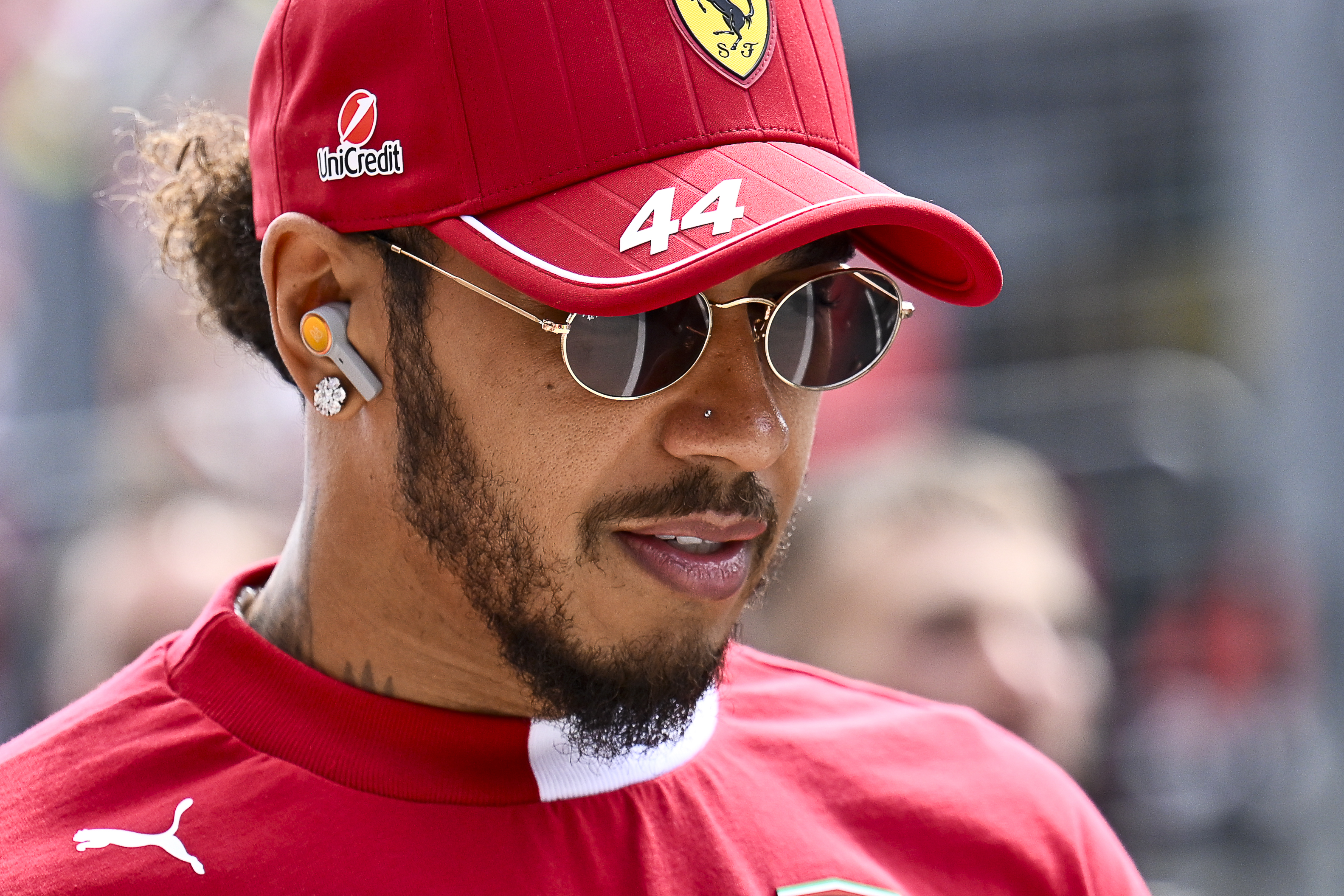 Ferrari driver Lewis Hamilton of the United Kingdom arrives to the drivers parade at the Hungaroring racetrack, in Mogyorod, Hungary, Sunday, Aug. 3, 2025, ahead of the Hungarian Formula One Grand Prix. 