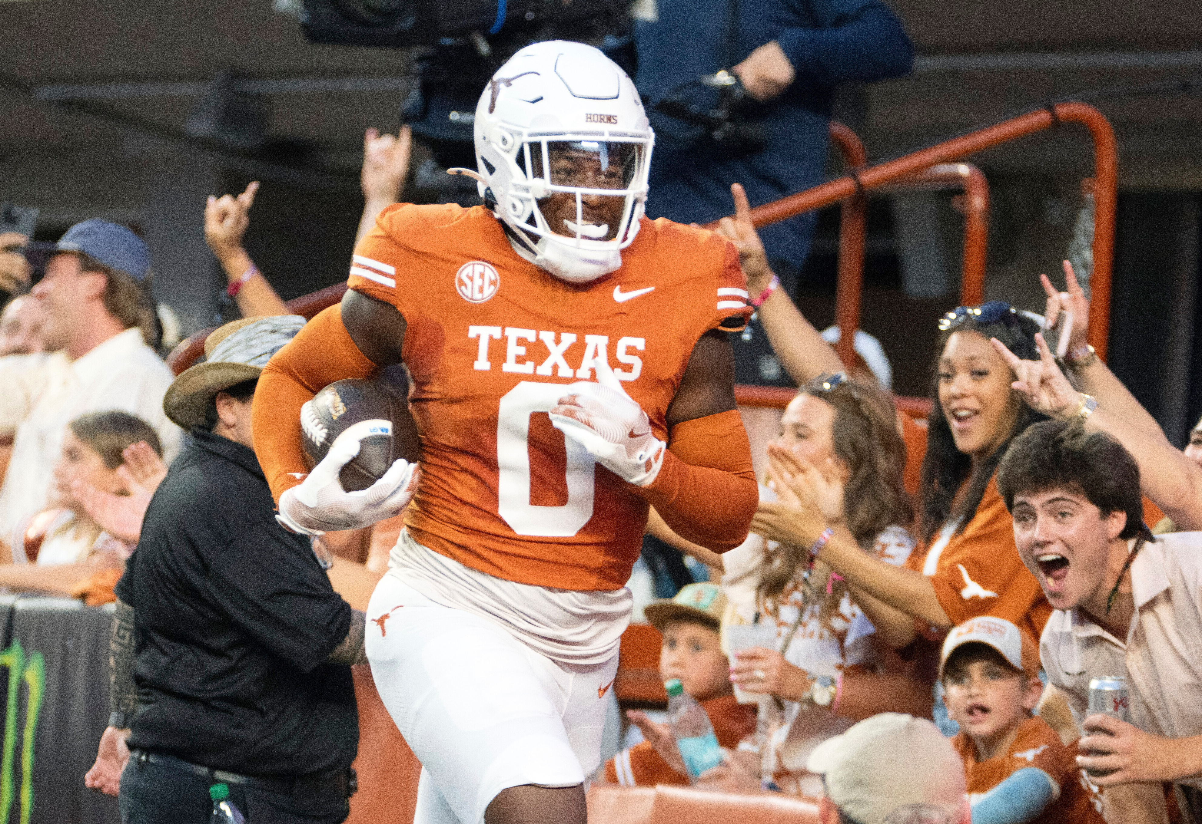 FILE - Texas linebacker Anthony Hill, Jr. runs through the back of the end zone after making an interception for a touchdown during the first half of an NCAA football game against Louisiana-Monroe, Saturday, Sept. 21, 2024, in Austin, Texas. 