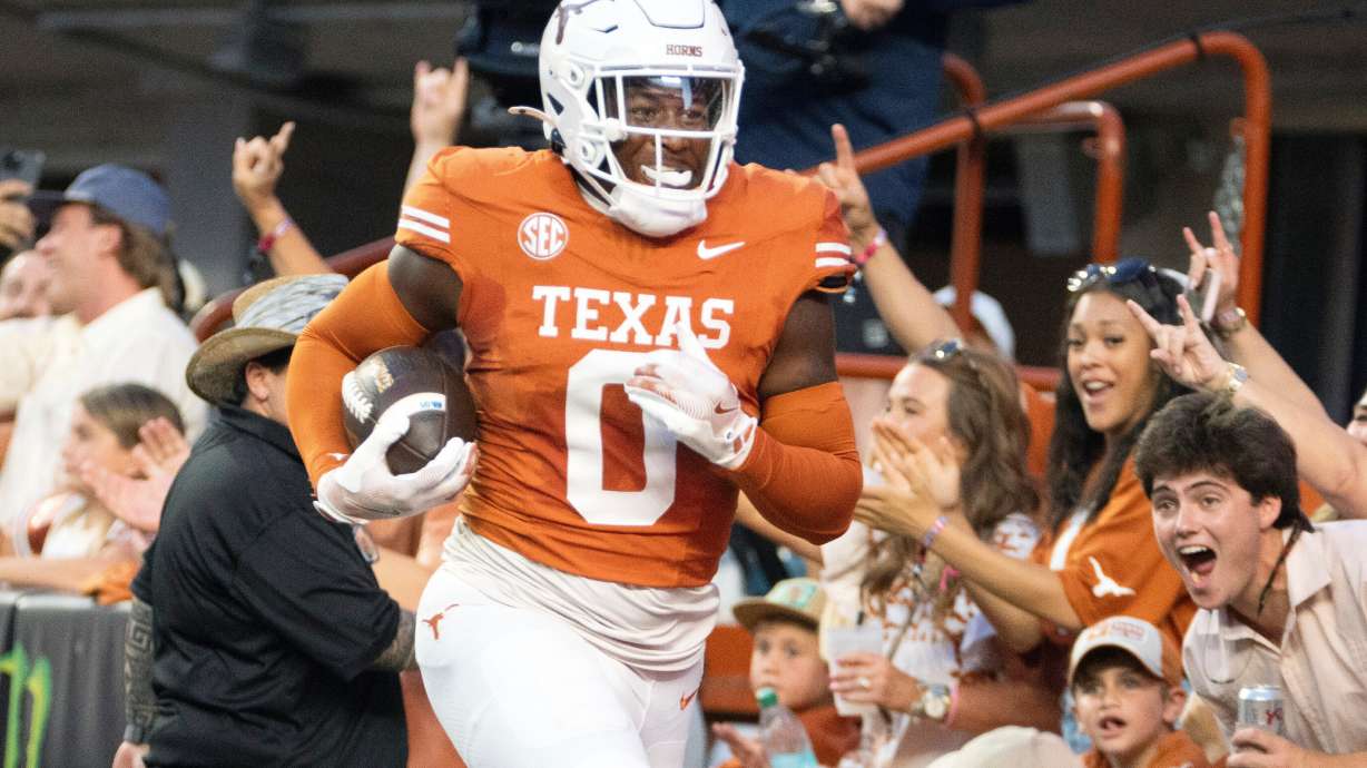 FILE - Texas linebacker Anthony Hill, Jr. runs through the back of the end zone after making an interception for a touchdown during the first half of an NCAA football game against Louisiana-Monroe, Saturday, Sept. 21, 2024, in Austin, Texas.