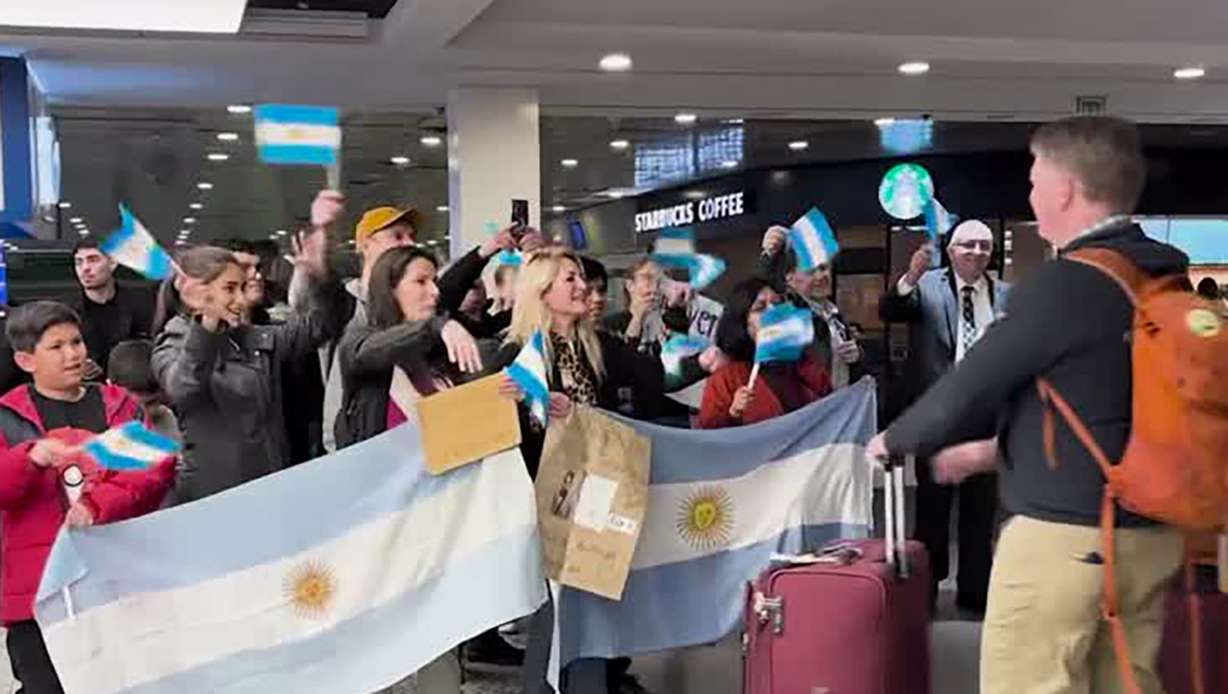 Latter-day Saints greet members of the Tabernacle Choir at Temple Square as they arriving in Buenos Aires, Argentina, Sunday. This marks the choir's first visit to the country.