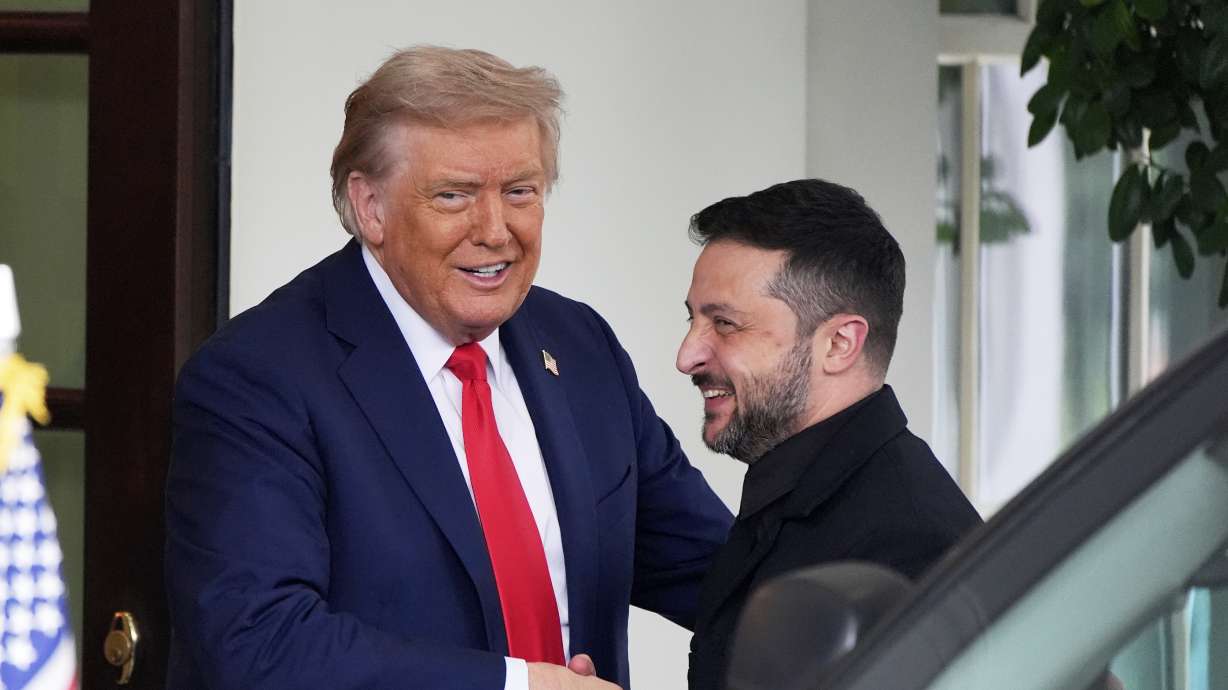 President Donald Trump, left, greets Ukraine's President Volodymyr Zelenskyy as he arrives at the White House, Monday in Washington.