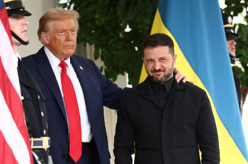 President Donald Trump greets Ukrainian President Volodymyr Zelenskyy at the White House, amid negotiations to end the Russian war in Ukraine, in Washington, D.C., Monday.