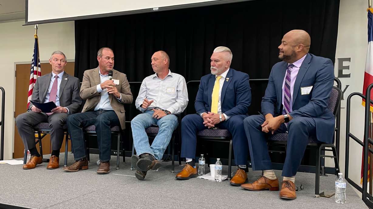 Utah House Speaker Mike Shultz, R-Hooper, addresses an immigration forum on Monday at Weber State University's Davis Campus in Layton. To his right sits U.S. Rep. Michael Kennedy, the Republican representative to Utah's 3rd District.