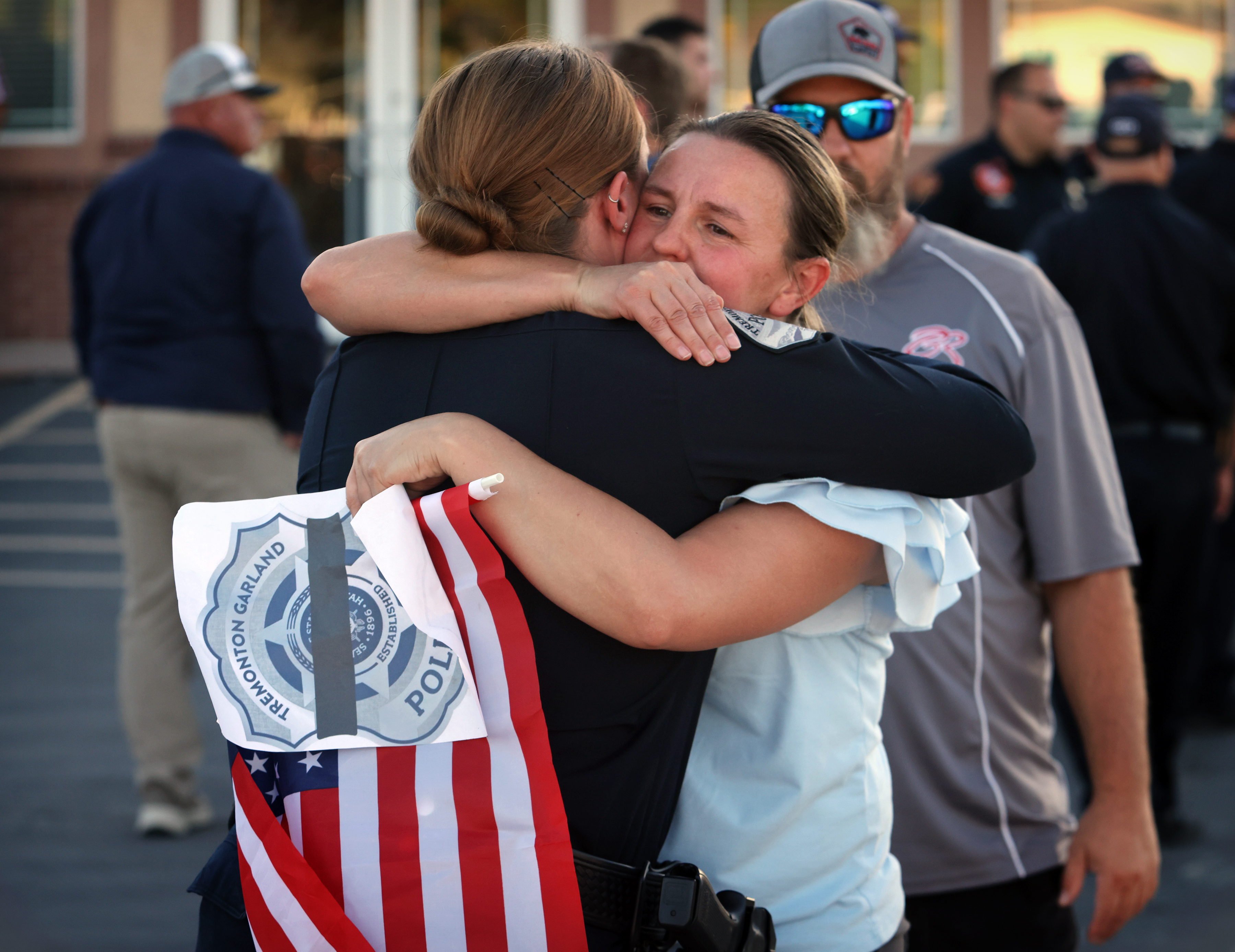 'These officers protect us': Thousands show up to honor 2 fallen Utah officers during procession