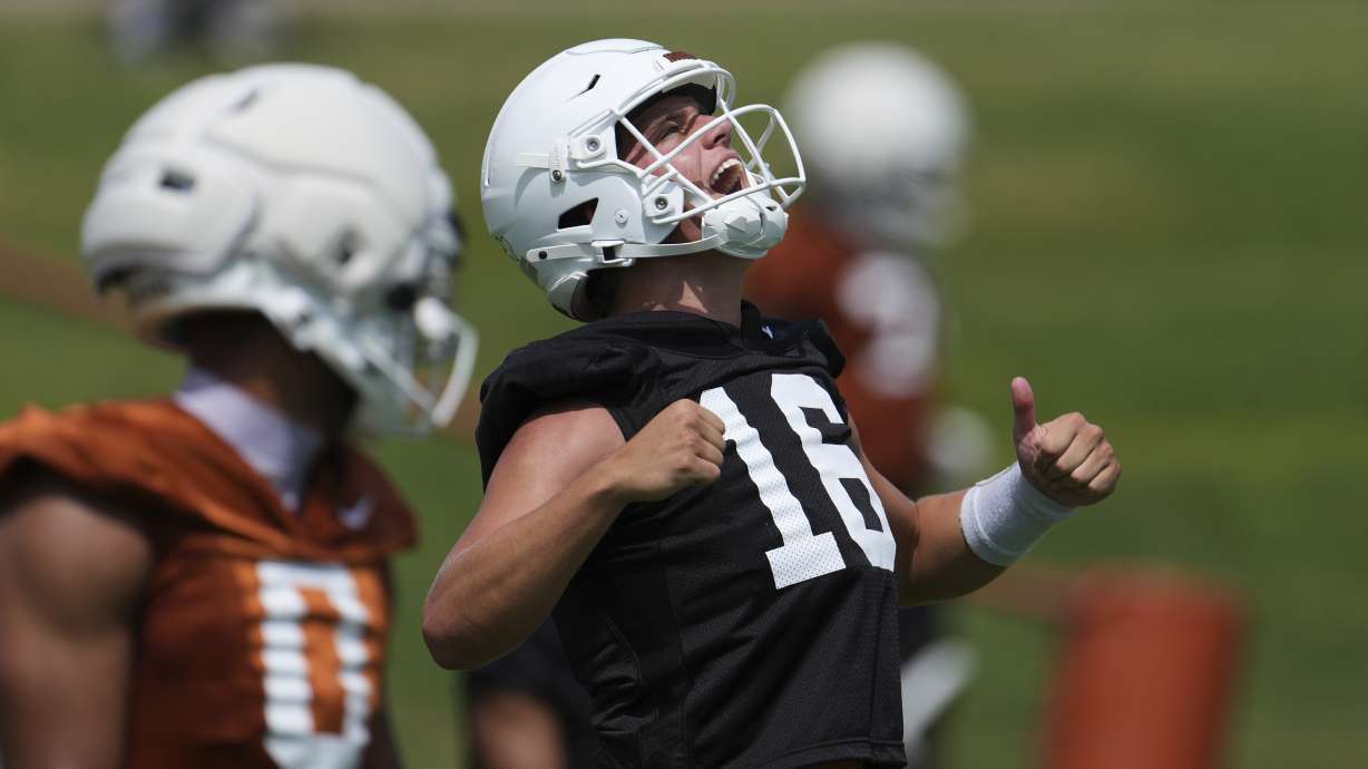 Texas quarterback Arch Manning (16) reacts during an NCAA college football practice in Austin, Texas, Wednesday, July 30, 2025.