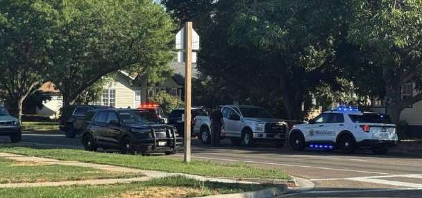 Idaho police discover 18-year-old woman dead after teen calls 911 about his armed father