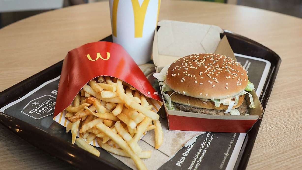 McDonald's and its U.S. franchisees have agreed to price eight popular combo meals at 15% less than the total cost of buying the items separately.