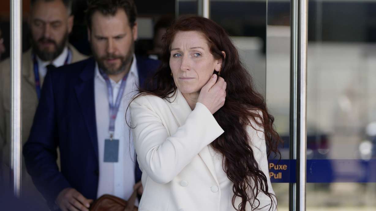 FILE - Lise Klaveness, president of the Football Association of Norway, leaves the venue after attending the 47th ordinary UEFA congress in Lisbon, Wednesday, April 5, 2023.