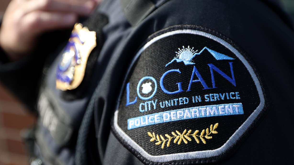 A Smithfield man has been charged with automobile homicide and accused of hitting and killing a pedestrian in a Logan parking lot while under the influence.