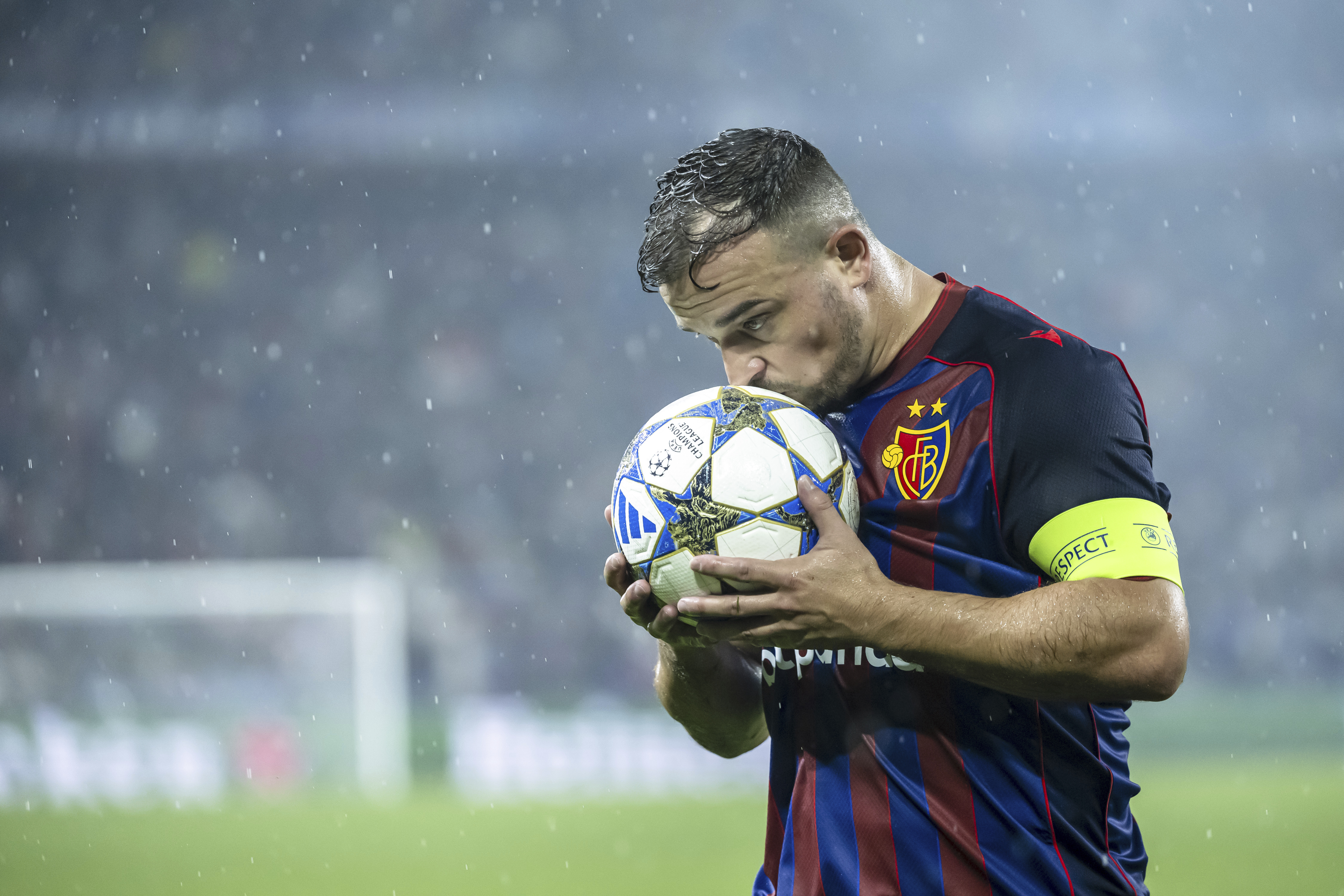 Basel's Xherdan Shaqiri kisses the ball during the UEFA Champions League playoff first leg match between Switzerland's FC Basel 1893 and Denmark's F.C. Copenhagen at the St. Jakob-Park stadium in Basel, Switzerland, on Wednesday, Aug. 20, 2025. 