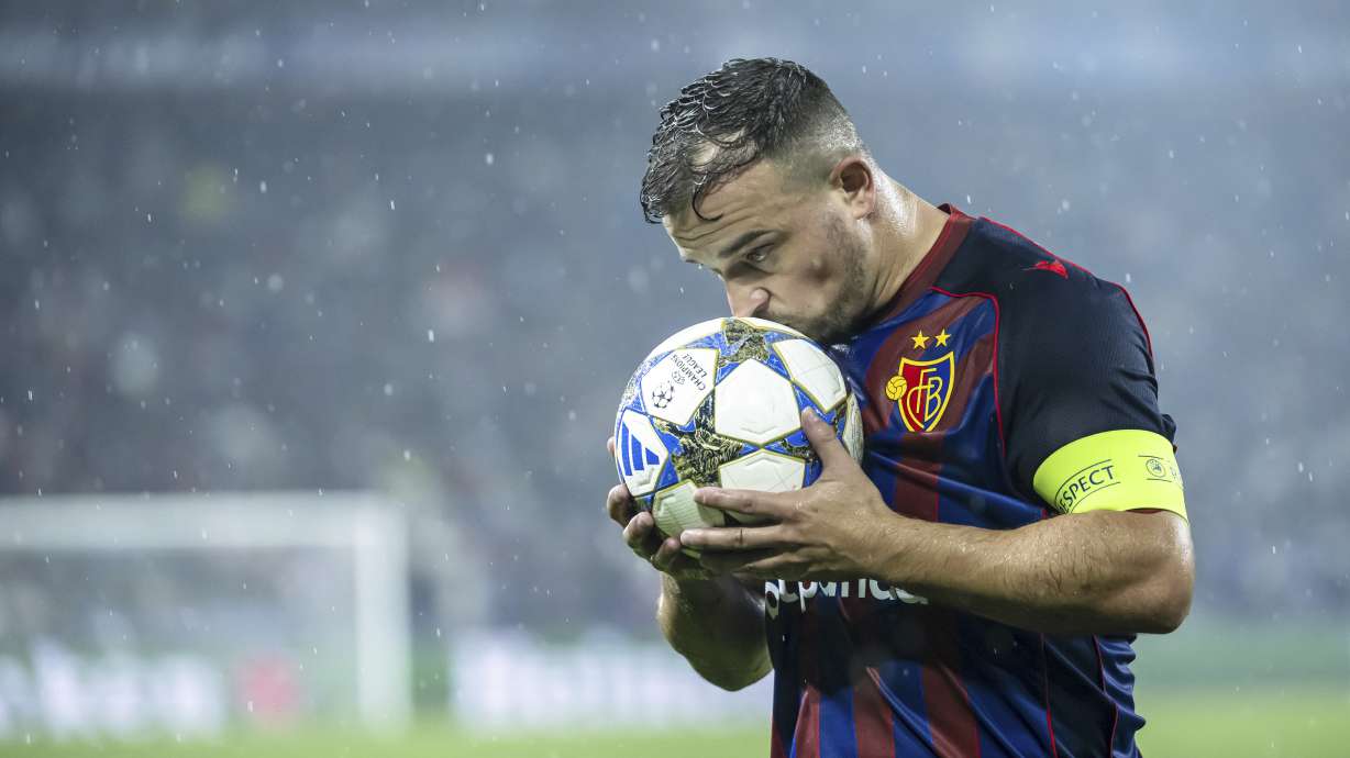 Basel's Xherdan Shaqiri kisses the ball during the UEFA Champions League playoff first leg match between Switzerland's FC Basel 1893 and Denmark's F.C. Copenhagen at the St. Jakob-Park stadium in Basel, Switzerland, on Wednesday, Aug. 20, 2025.
