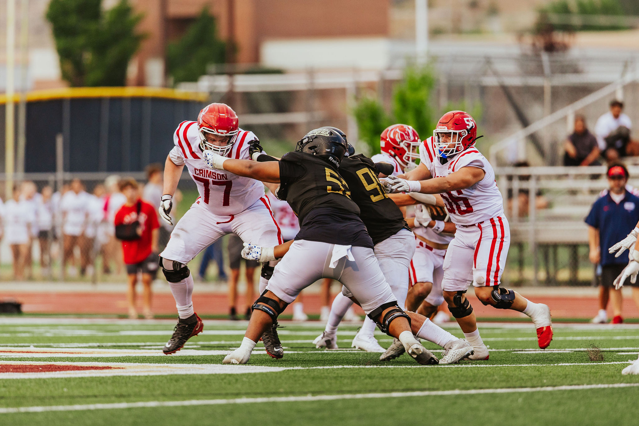 Lone Peak's Bott Mulitalo (52) lines up at defensive end during a Utah high school football game against Crimson Cliffs, Friday, Aug. 15, 2025 in Highland, Utah.