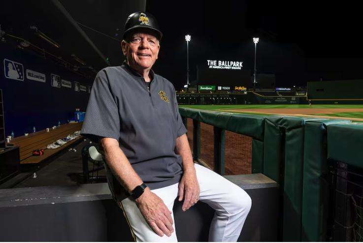 Gene Chidester, 76, a batboy for the Salt Lake Bees, poses for a portrait next to the visiting team’s dugout after a Minor League Baseball game between the Bees and the Las Vegas Aviators held at The Ballpark at America First Square in South Jordan on Aug. 5.