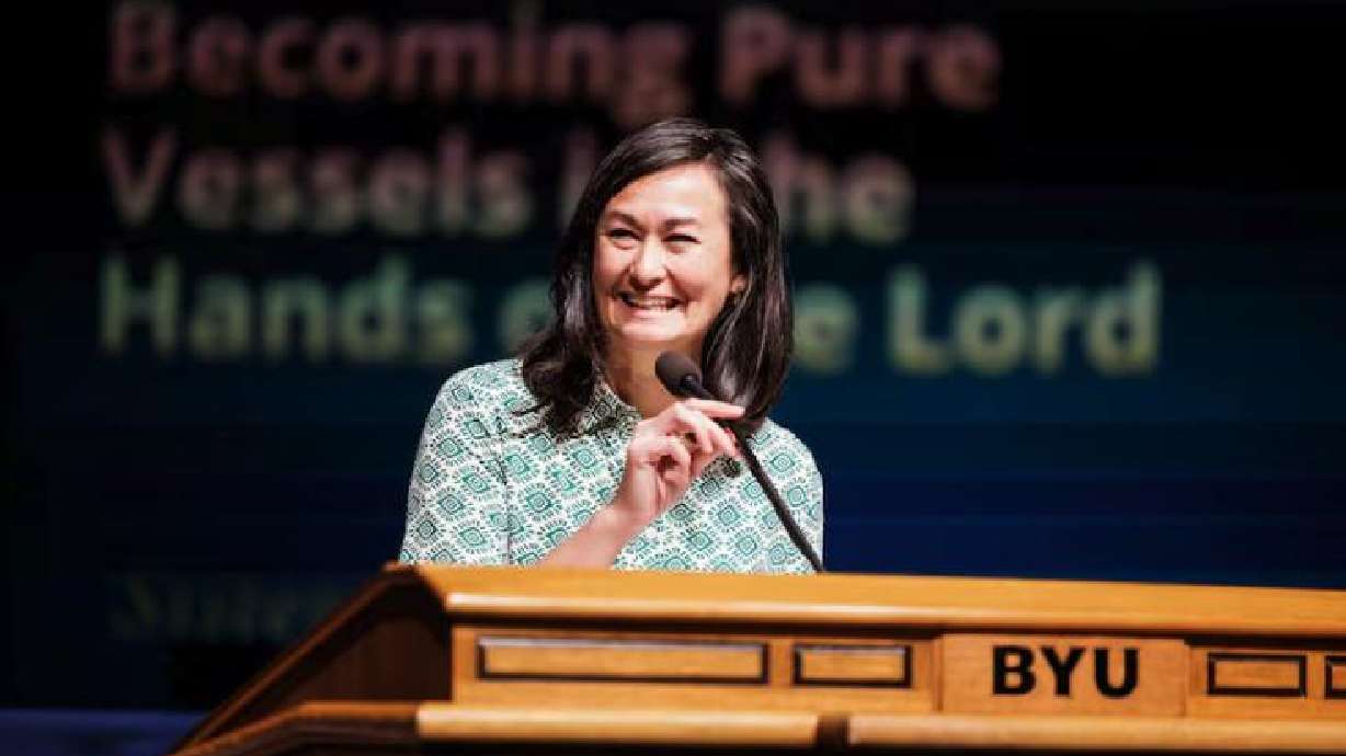 Sister Kristin M. Yee, second counselor in the Relief Society general presidency, speaks in the Marriott Center during BYU Education Week in Provo, Thursday.