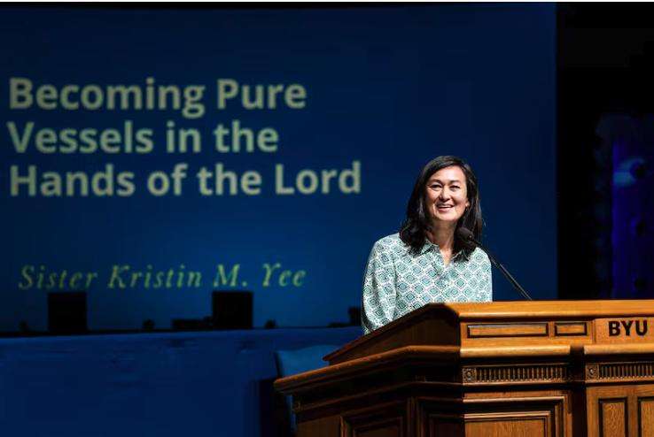 Sister Kristin M. Yee, second counselor in the Relief Society general presidency of The Church of Jesus Christ of Latter-day Saints, speaks during a session held as part of BYU Education Week at the Marriott Center on the campus of Brigham Young University in Provo on Thursday.