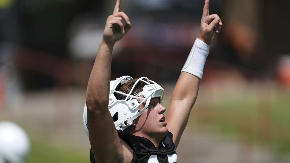 Texas quarterback Arch Manning (16) reacts during an NCAA college football practice in Austin, Texas, Wednesday, July 30, 2025.