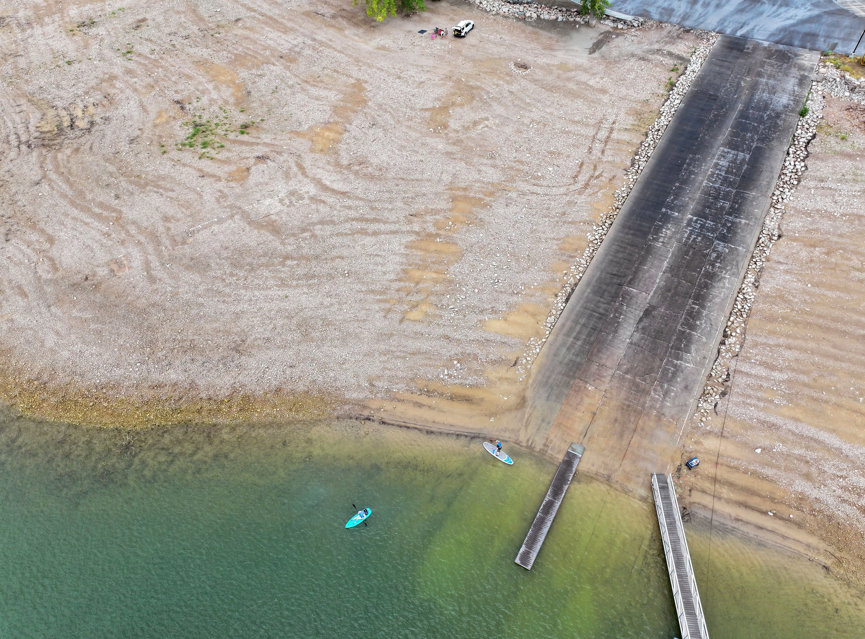 Randy and Annette Smith of Grantsville head out to kayak and paddleboard Echo Reservoir at Echo State Park in Coalville on Friday.