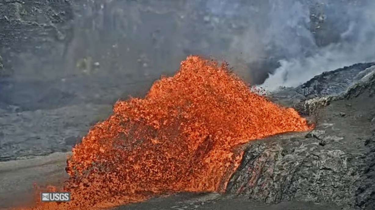 In this screenshot taken from video provided by the U.S. Geological Survey, the Kilauea volcano spews lava on Friday, in Hawaii Volcanoes National Park, Hawaii.
