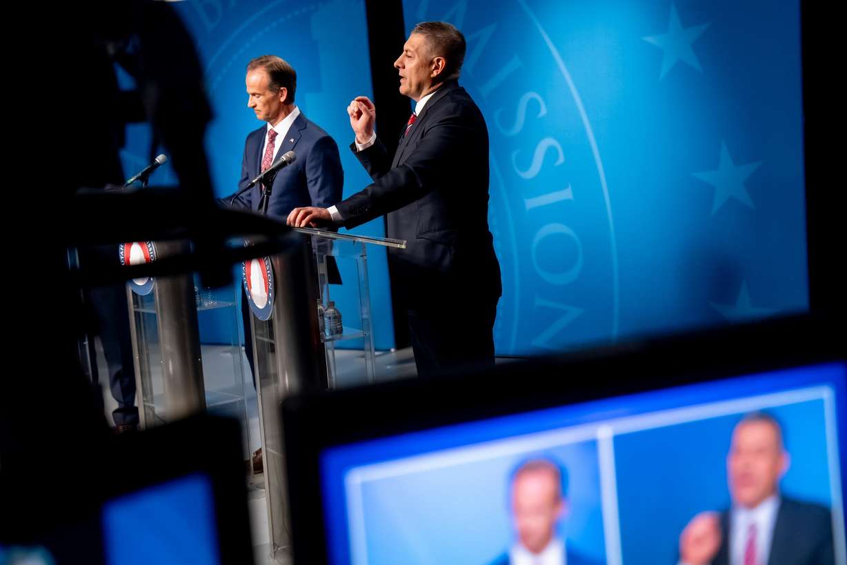 Case Lawrence and Stewart Peay take part in a televised debate at the Eccles Broadcast Center in Salt Lake City on June 12, 2024.