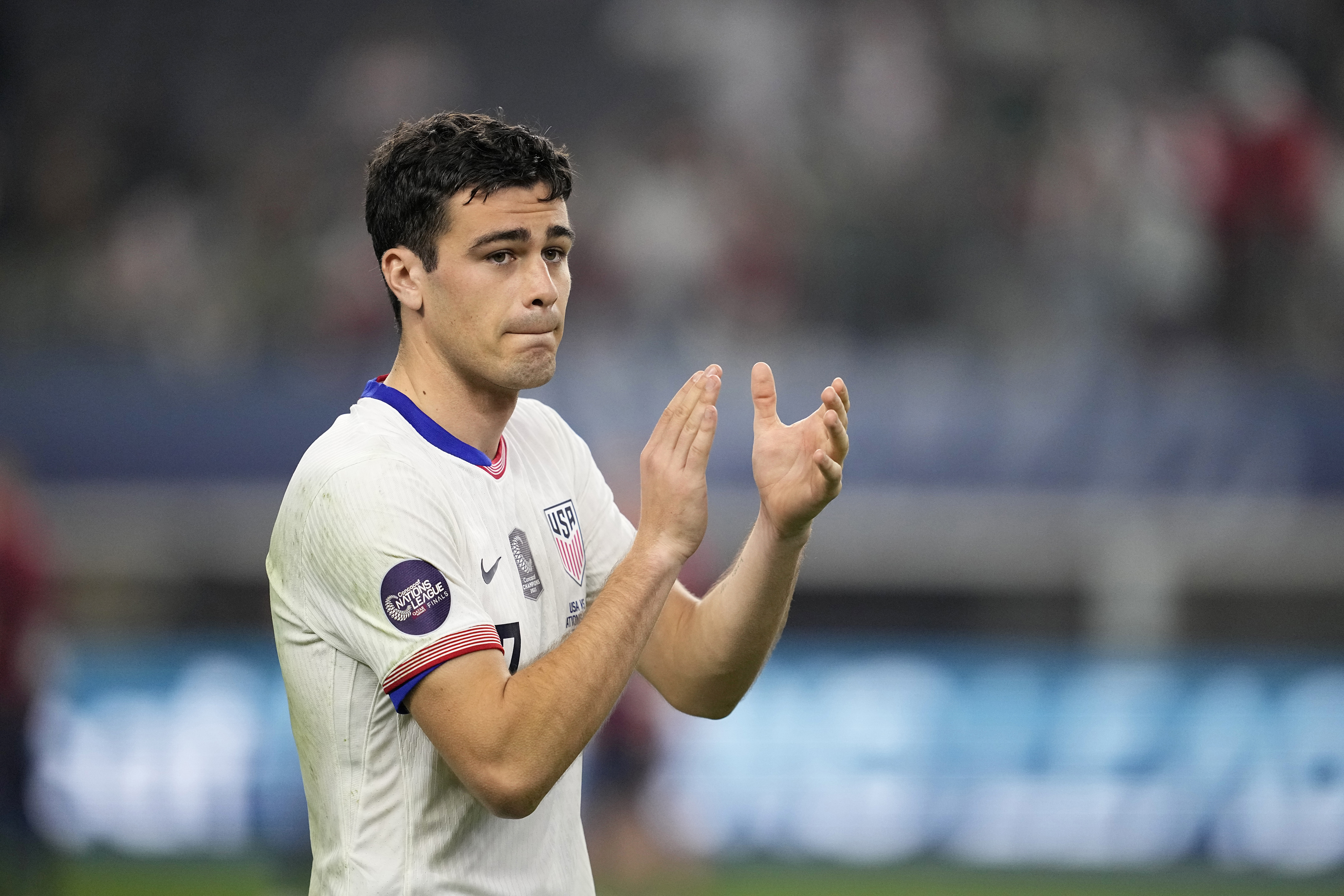 FILE - United States' Gio Reyna walks to the stage during the trophy presentation after a CONCACAF Nations League final soccer match against Mexico, Sunday, March 24, 2024, in Arlington, Texas. 