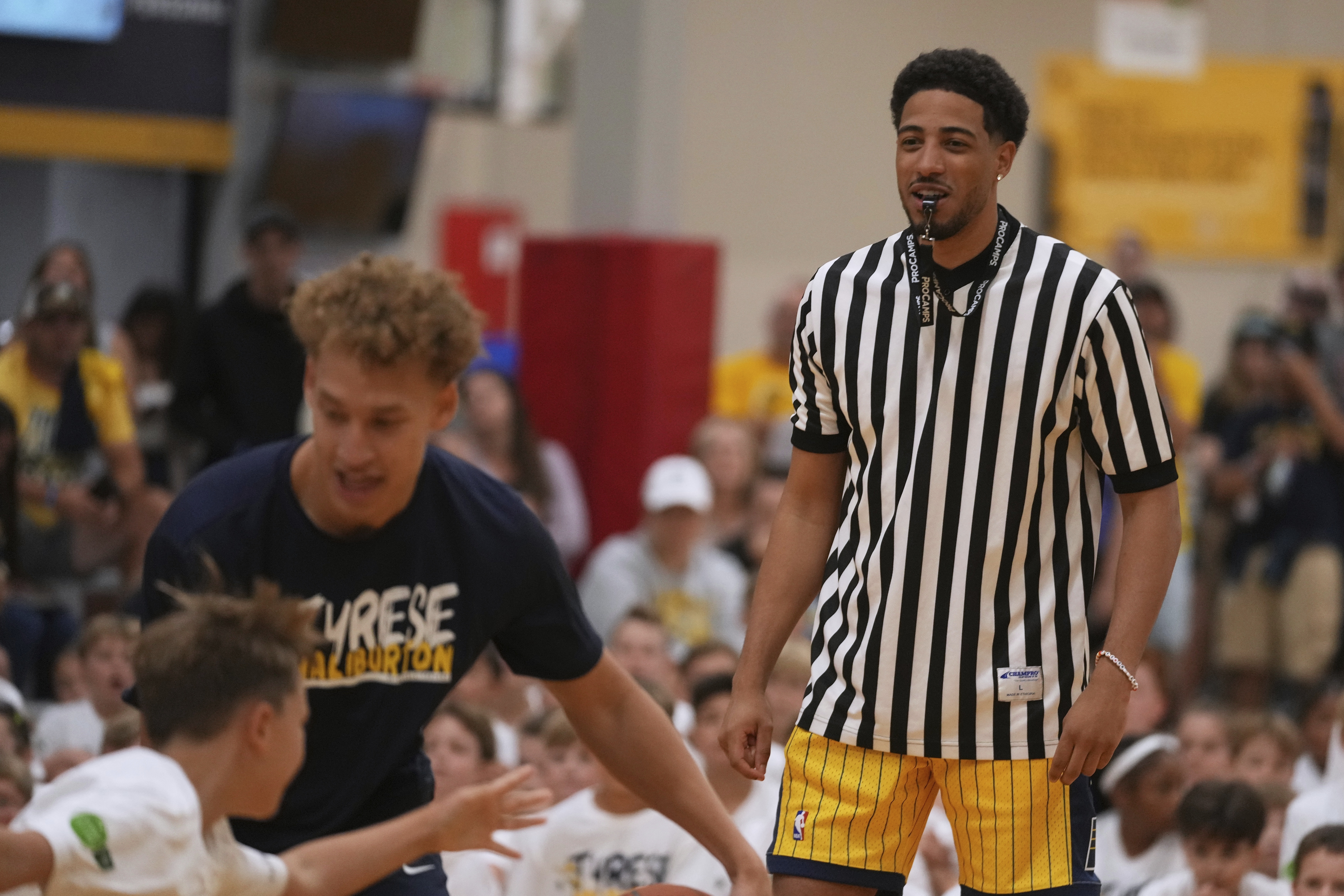 Indiana Pacers' Tyrese Haliburton watches a scrimmage during his basketball camp at the Indiana Pacers Athletic Center, Saturday, Aug. 23, 2025, in Westfield, Ind. 