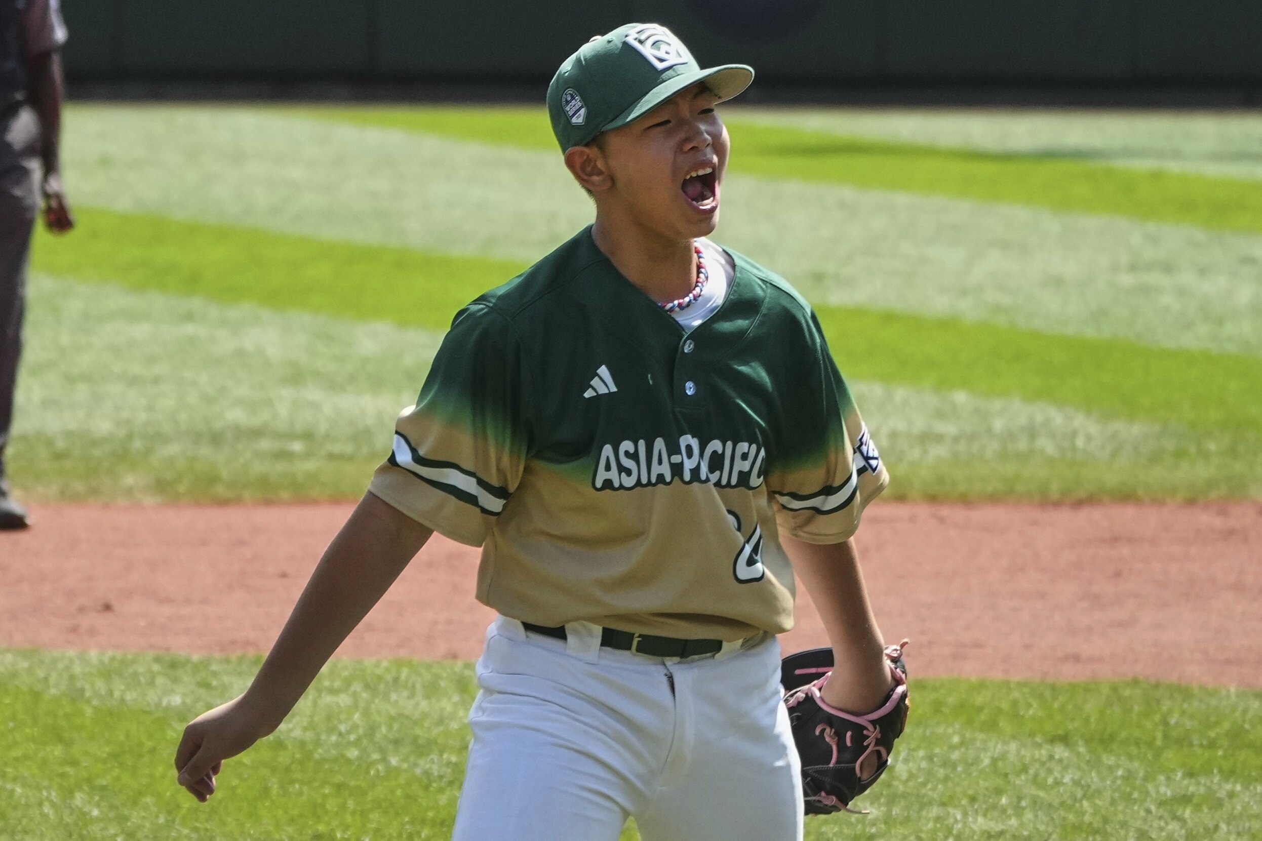 Taiwan's Chen Qi-Sheng (24) celebrates after getting the final out of the International Championship baseball game against Aruba at the Little League World Series tournament in South Williamsport, Pa., Saturday, Aug. 23, 2025. 