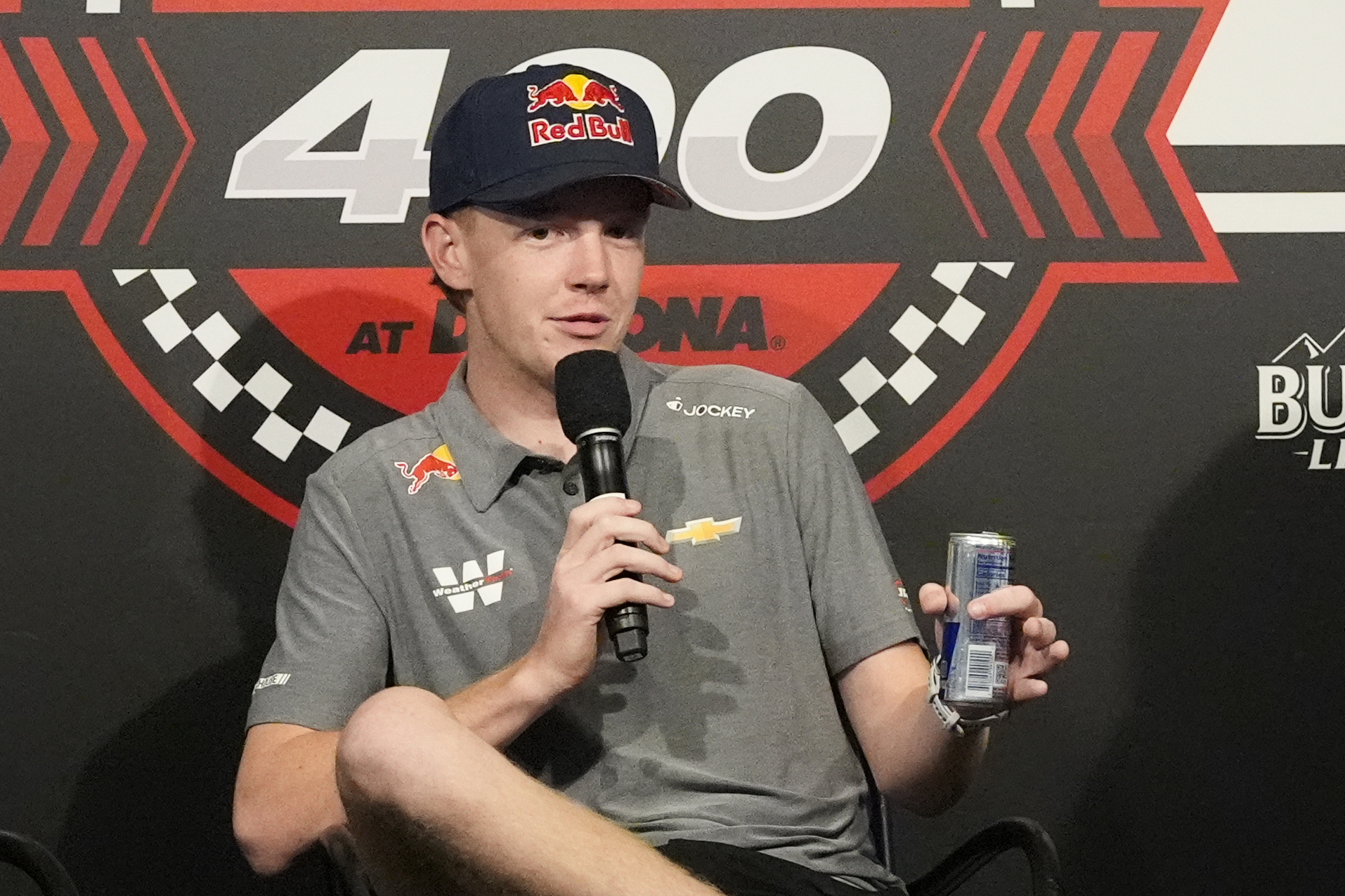 NASCAR driver Connor Zilisch answers questions during an auto racing news conference at Daytona International Speedway, Saturday, Aug. 23, 2025, in Daytona Beach, Fla. 