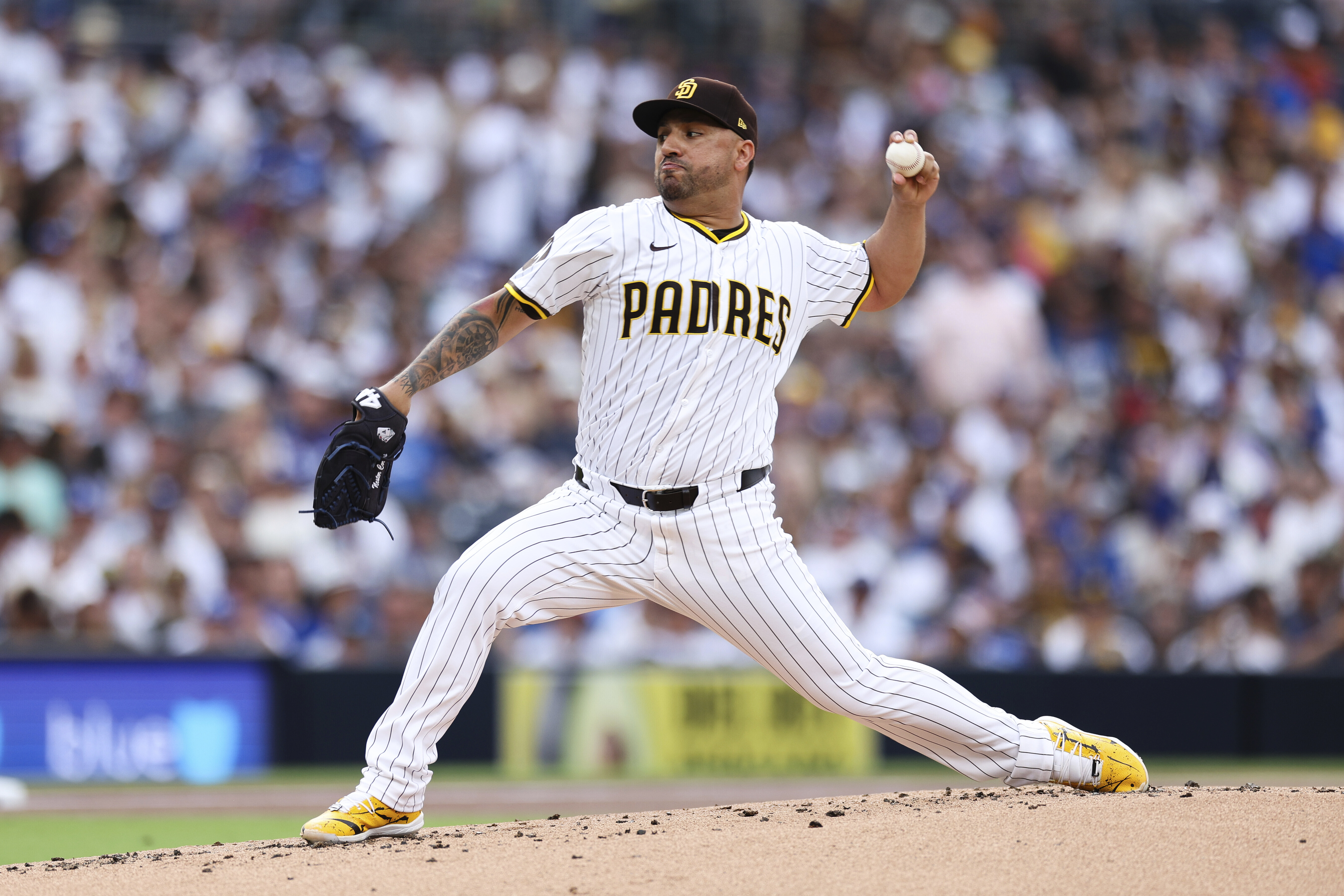 San Diego Padres starting pitcher Nestor Cortes works against the Los Angeles Dodgers in the second inning of a baseball game Saturday, Aug. 23, 2025, in San Diego. 