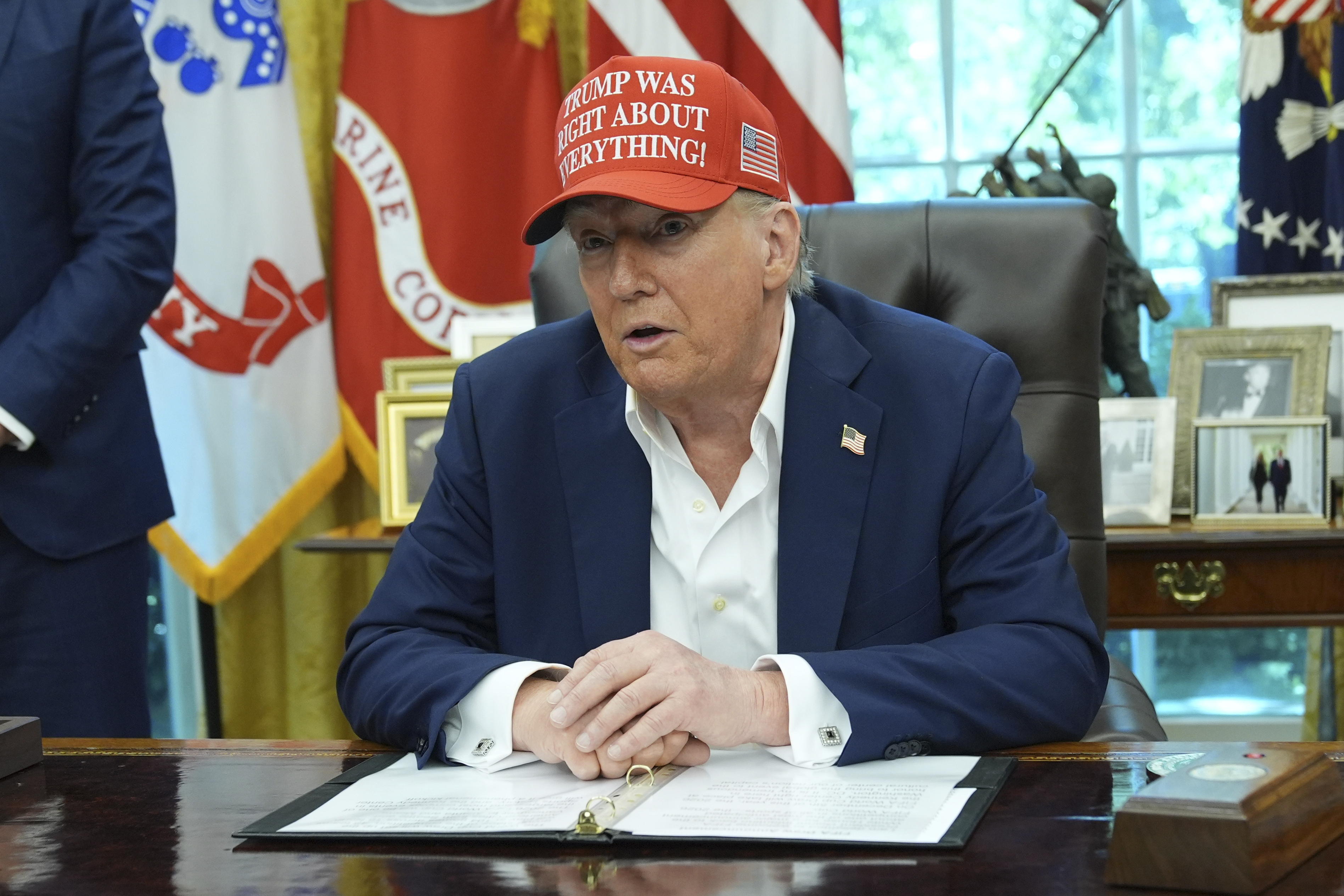 President Donald Trump speaks in the Oval Office of the White House, Friday, Aug. 22, 2025, in Washington. 