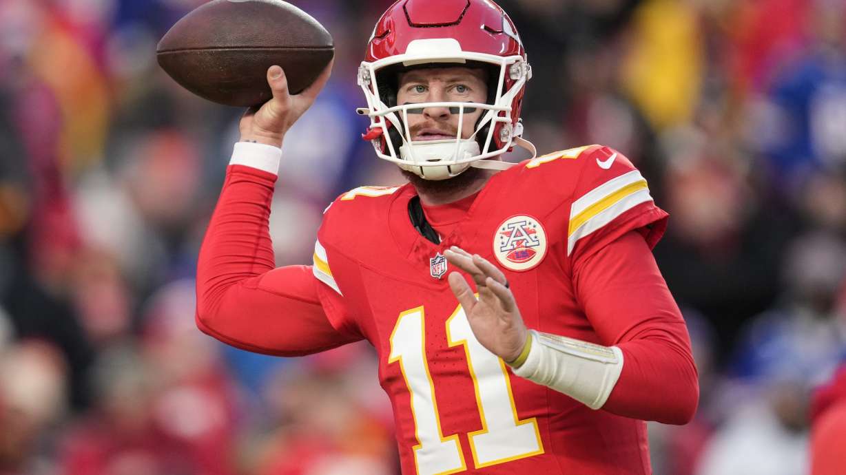 FILE - Kansas City Chiefs quarterback Carson Wentz (11) warms up before the AFC Championship NFL football game against the Buffalo Bills, Jan. 26, 2025, in Kansas City, Mo.