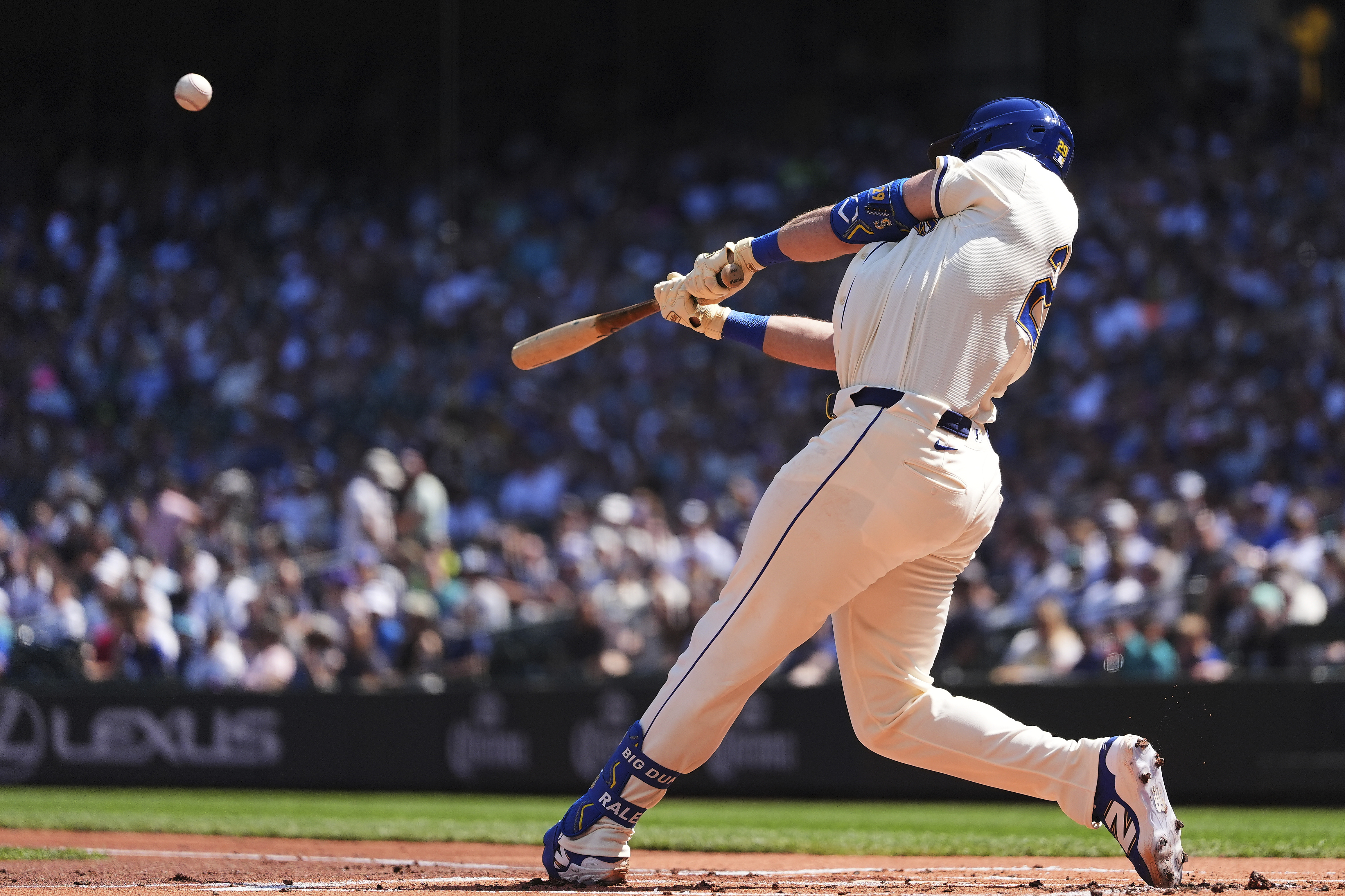 Seattle Mariners' Cal Raleigh hits a two-run home run against the Athletics during the first inning of a baseball game Sunday, Aug. 24, 2025, in Seattle.