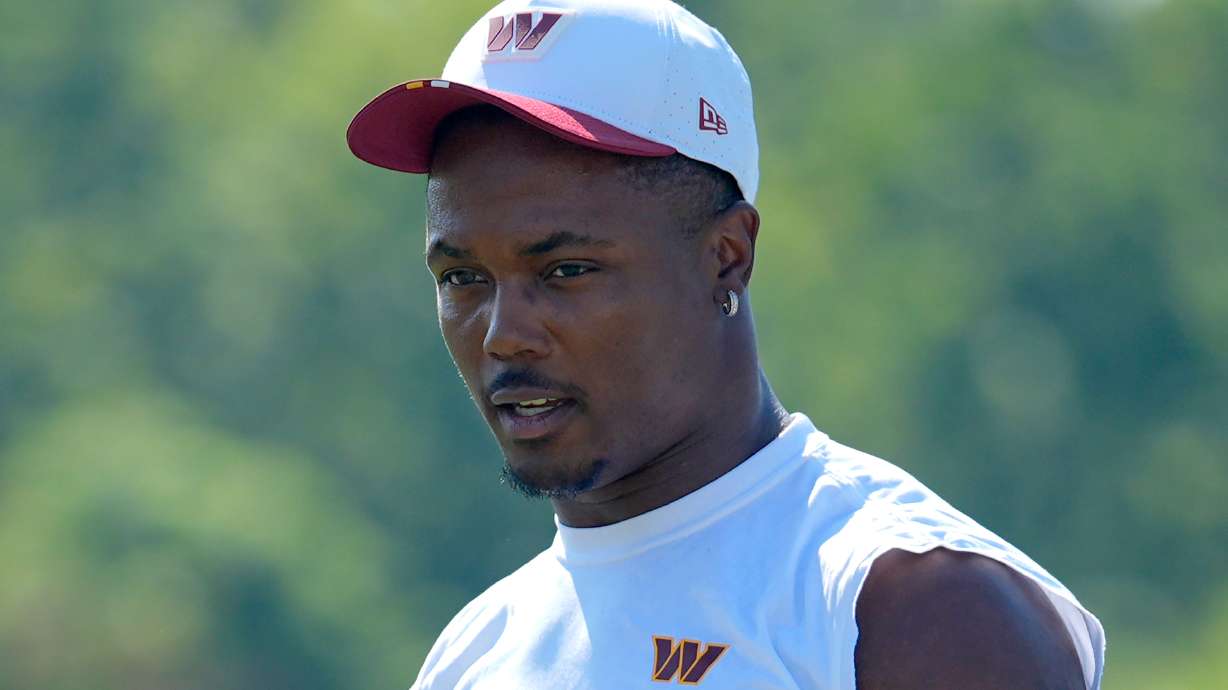 Washington Commanders wide receiver Terry McLaurin walks across the field after a practice at the team's NFL football training camp, Sunday, July 27, 2025, in Ashburn, Va.