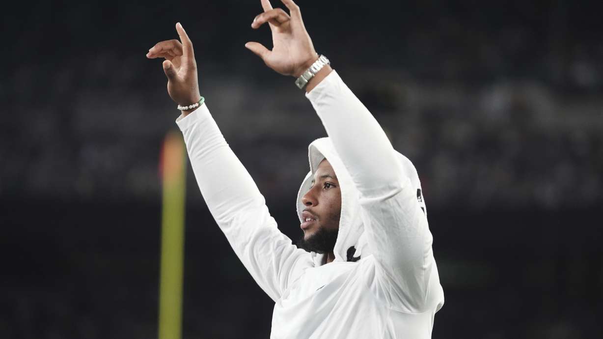 Philadelphia Eagles running back Saquon Barkley reacts in the second half of a preseason NFL football game against the New York Jets in East Rutherford, N.J., Friday, Aug. 22, 2025.