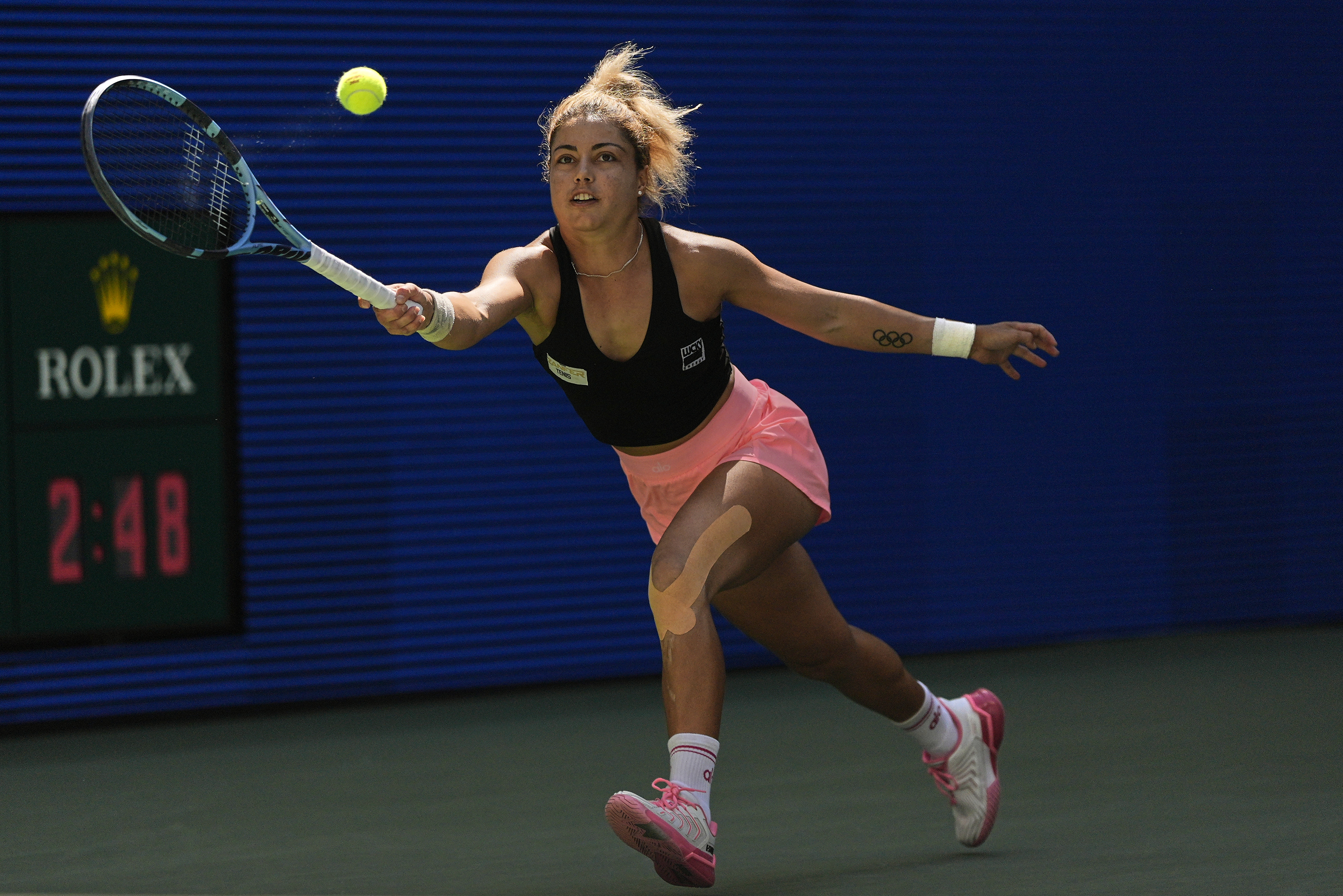 Renata Zarazua, of Mexico, returns a shot to Madison Keys, of the United States, during the first round of the US Open tennis championships, Monday, Aug. 25, 2025, in New York. 