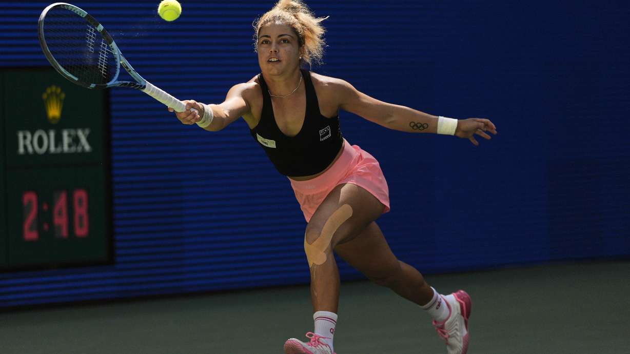 Renata Zarazua, of Mexico, returns a shot to Madison Keys, of the United States, during the first round of the US Open tennis championships, Monday, Aug. 25, 2025, in New York.