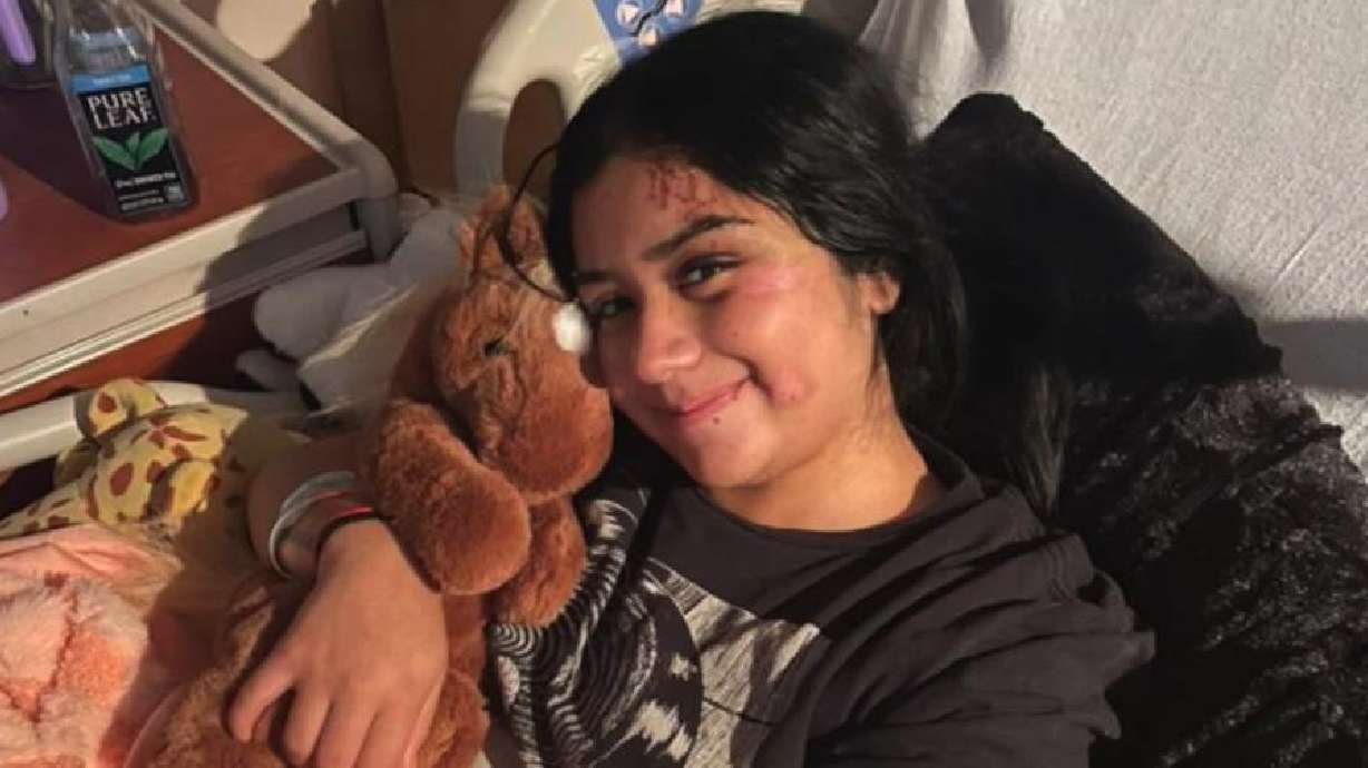 Emmie Kanosh smiles from her hospital bed in St. George, Sunday.