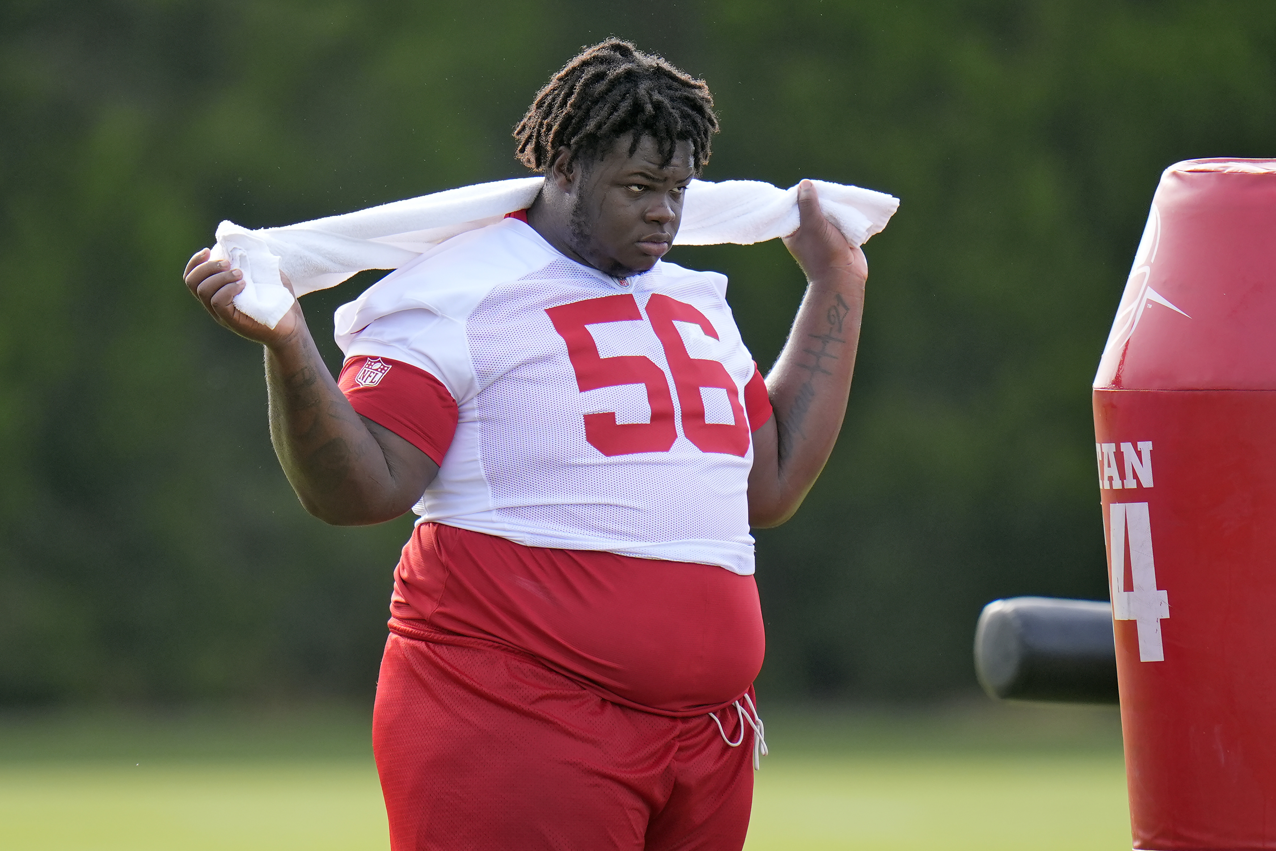 FILE - Tampa Bay Buccaneers defensive tackle Desmond Watson watches from the sideline during practice at NFL football training camp, Wednesday, July 23, 2025, in Tampa, Fla. 