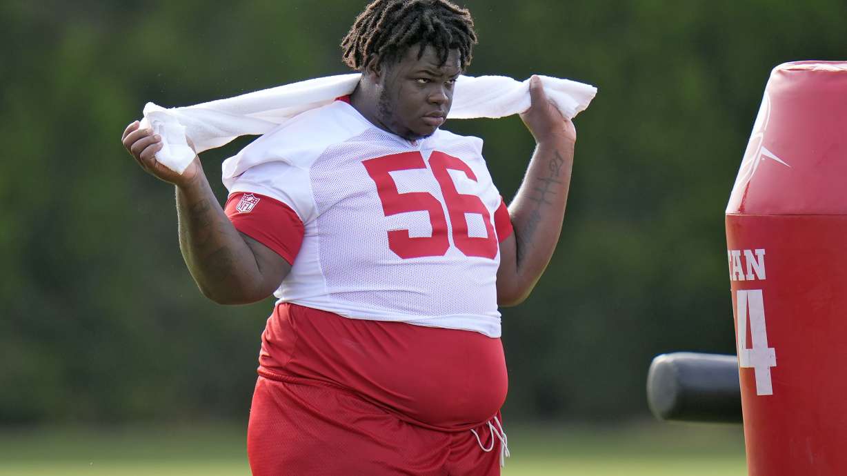 FILE - Tampa Bay Buccaneers defensive tackle Desmond Watson watches from the sideline during practice at NFL football training camp, Wednesday, July 23, 2025, in Tampa, Fla.