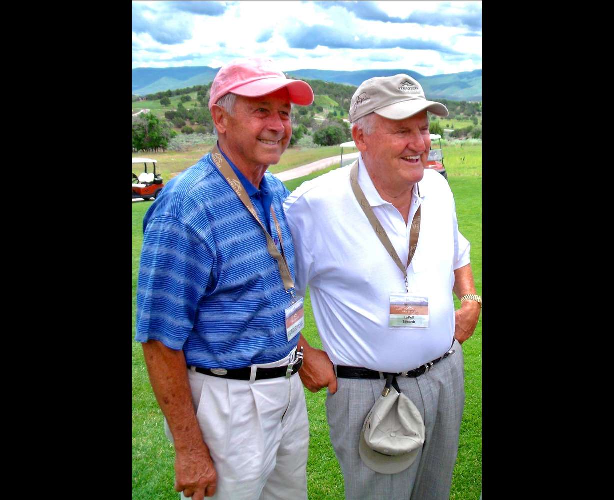 Ernie Schneiter Jr. visits with the late BYU football head coach Lavell Edwards at Red Ledges in 2009. Schneiter is encouraging others to embrace the game of golf in order to be more social.