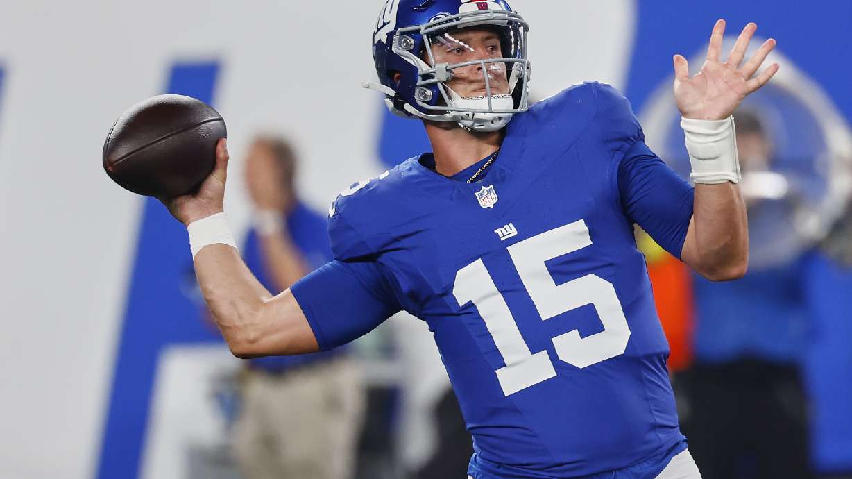 New York Giants quarterback Tommy DeVito (15) passes against the New York Jets during the fourth quarter of an NFL football game, Saturday, Aug. 16, 2025, in East Rutherford, N.J.