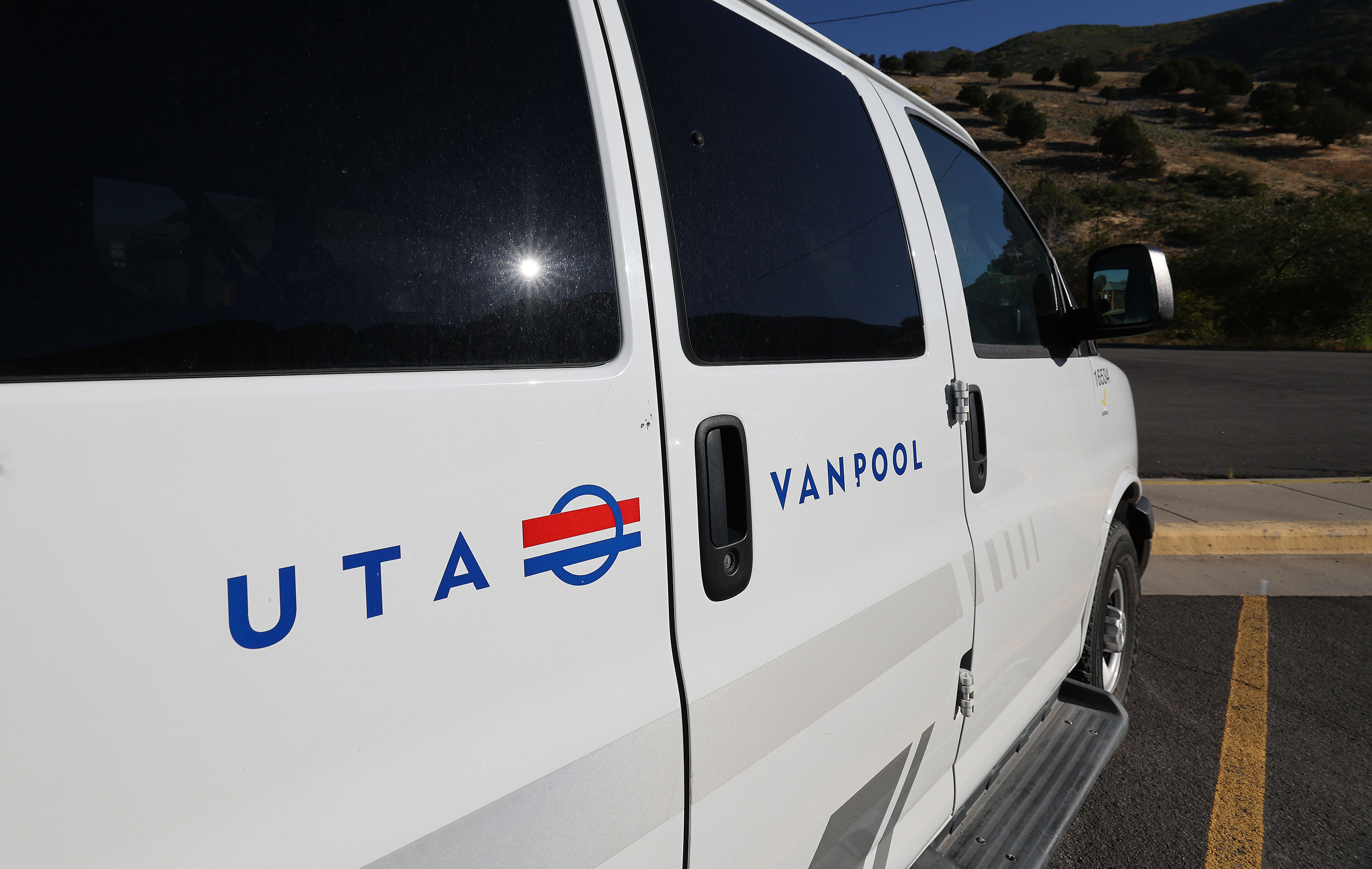A man was arrested in Midvale early Tuesday for allegedly setting three vans owned by the Utah Transit Authority ablaze. 