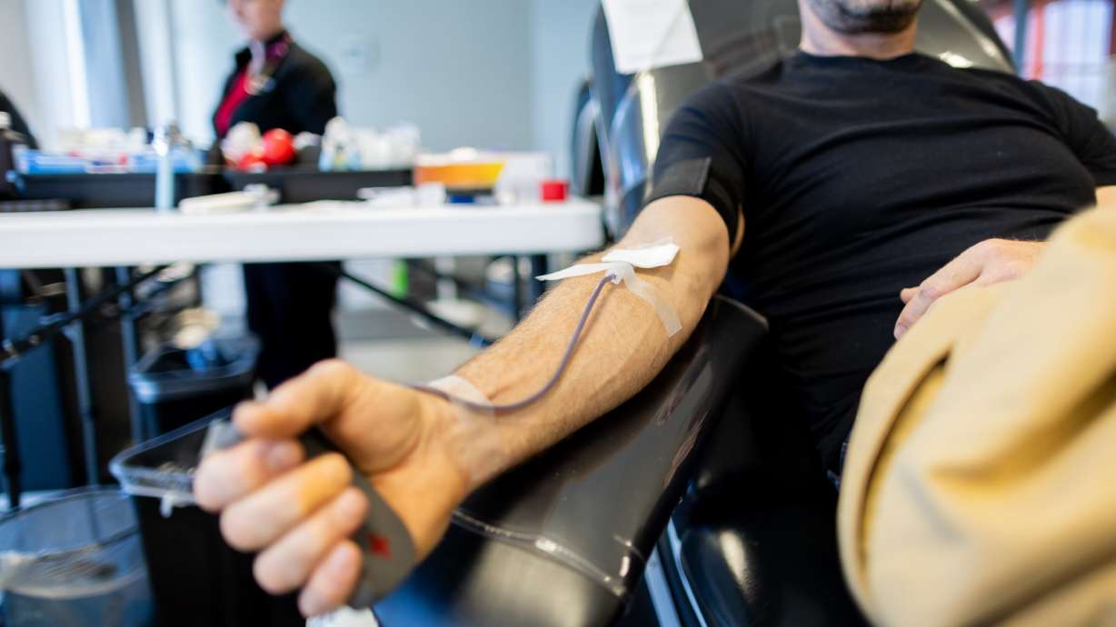 Tom Swapp, from Cottonwood Heights, donates blood at the American Red Cross Blood Donation Center in Murray on Jan. 26.