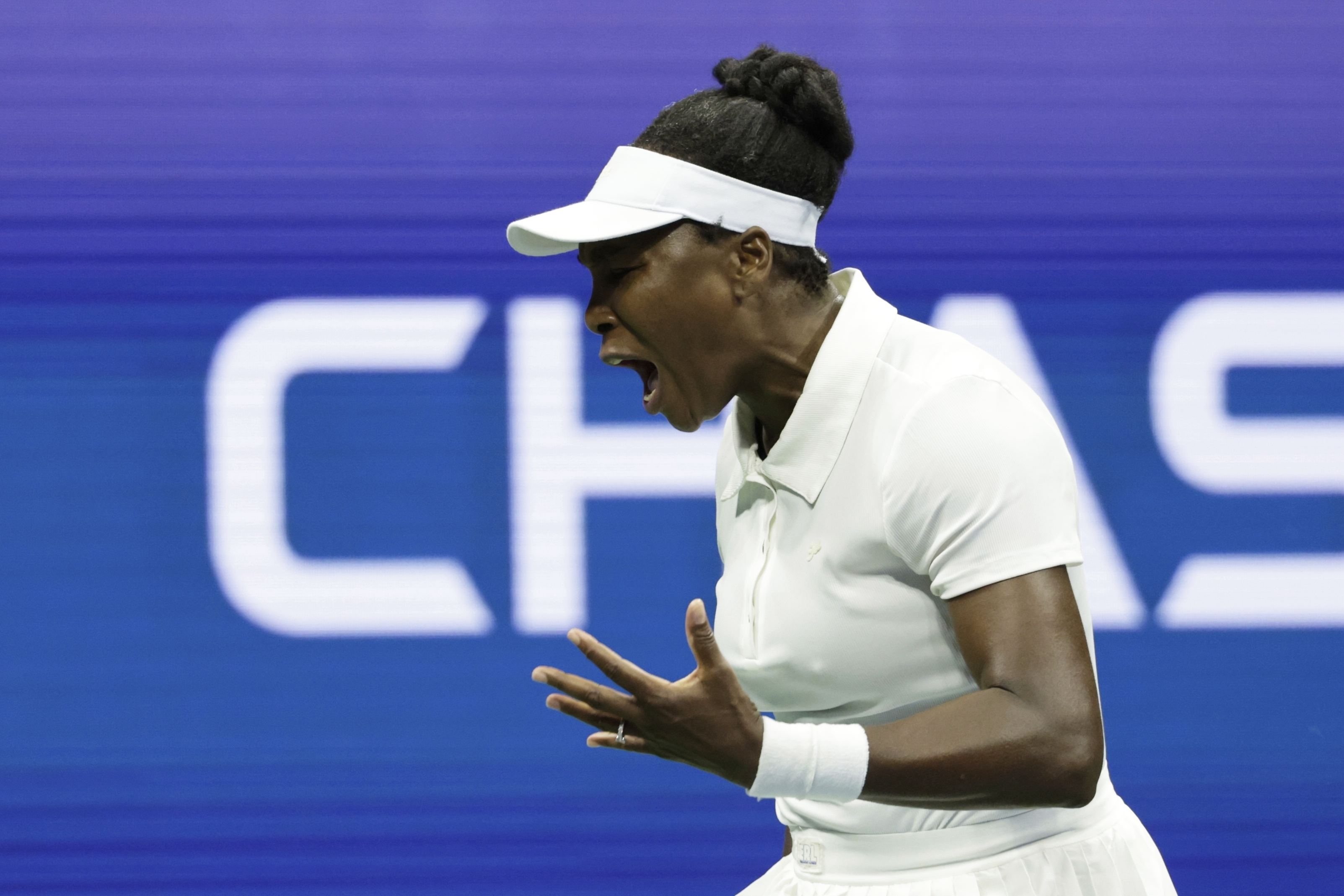 Venus Williams, of the United States, reacts against Karolina Muchova, of the Czech Republic, during the first round of the U.S. Open tennis championships, Monday, Aug. 25, 2025, in New York. 
