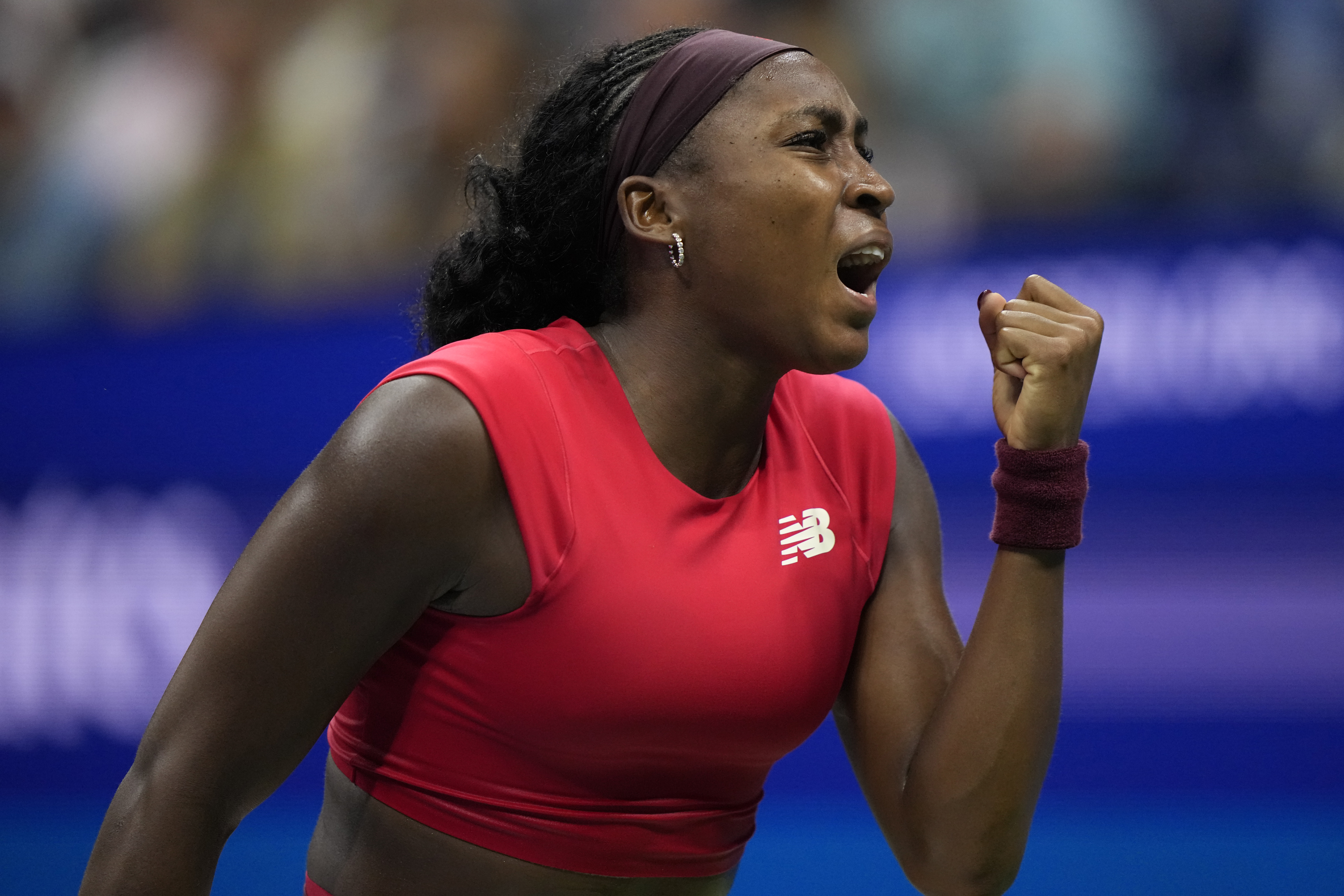 Coco Gauff, of the United States, reacts after scoring a point in the second set against Ajla Tomljanovic, of Australia, during the first round of the U.S. Open tennis championships, Tuesday, Aug. 26, 2025, in New York. 