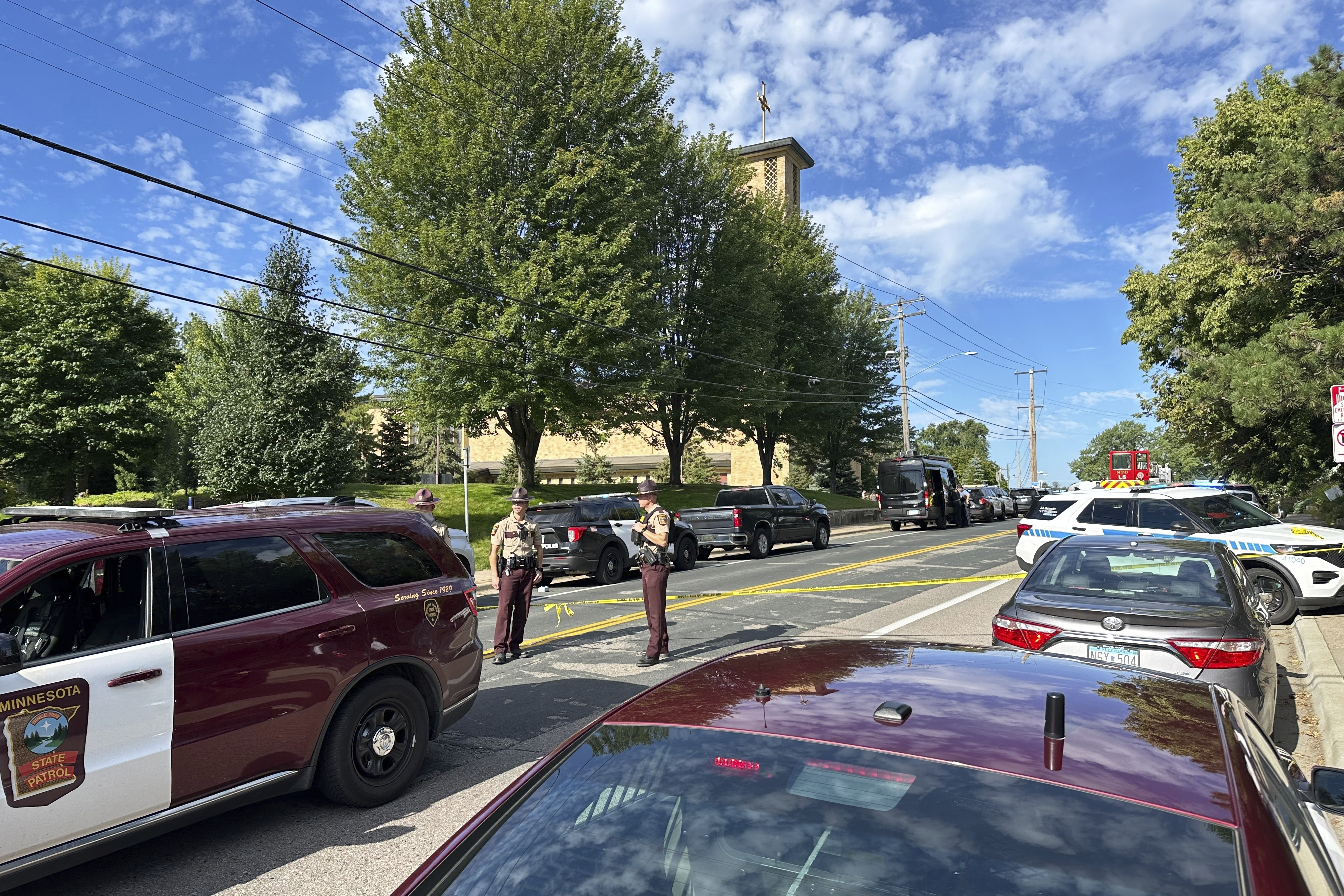 Minneapolis police: shooting at Catholic school has left 3 dead, including shooter, and 17 injured