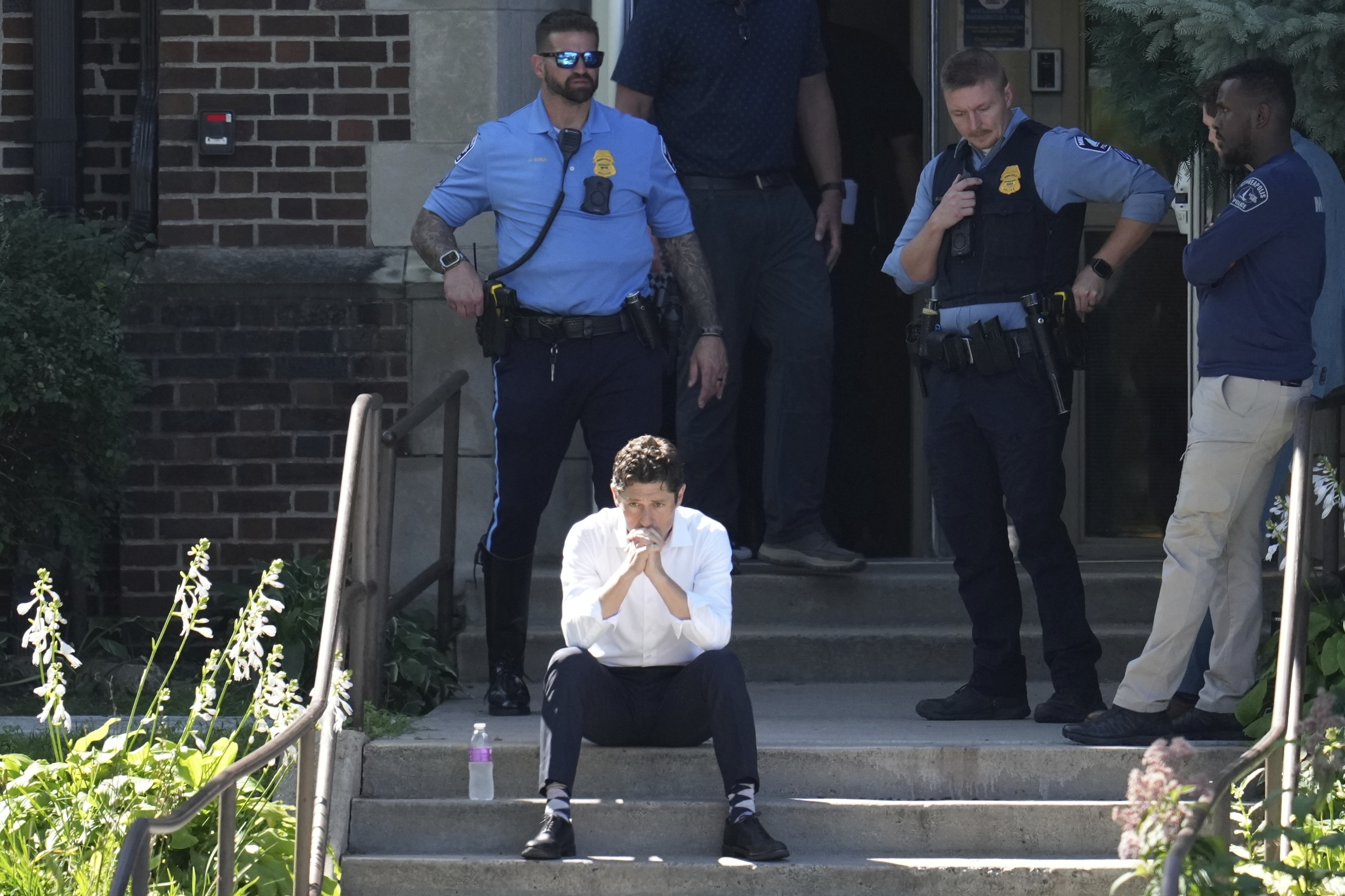 Minneapolis Mayor Jacob Frey at the Annunciation Church's school, Wednesday, in Minneapolis. Police Chief Brian O'Hara said two children were killed and 17 other people were injured in a shooting at the school.